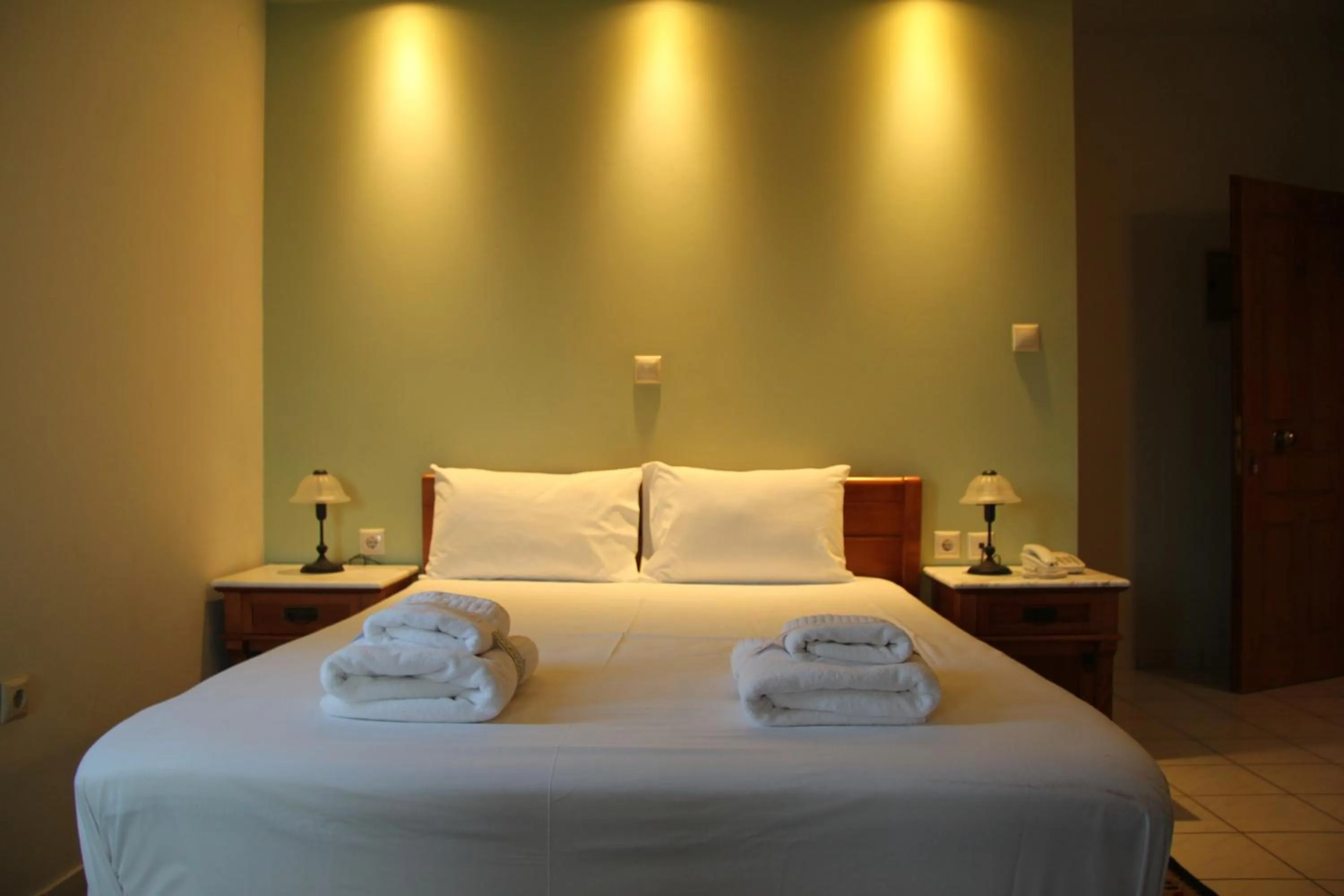 Bed in The Flower Of Monemvasia Hotel