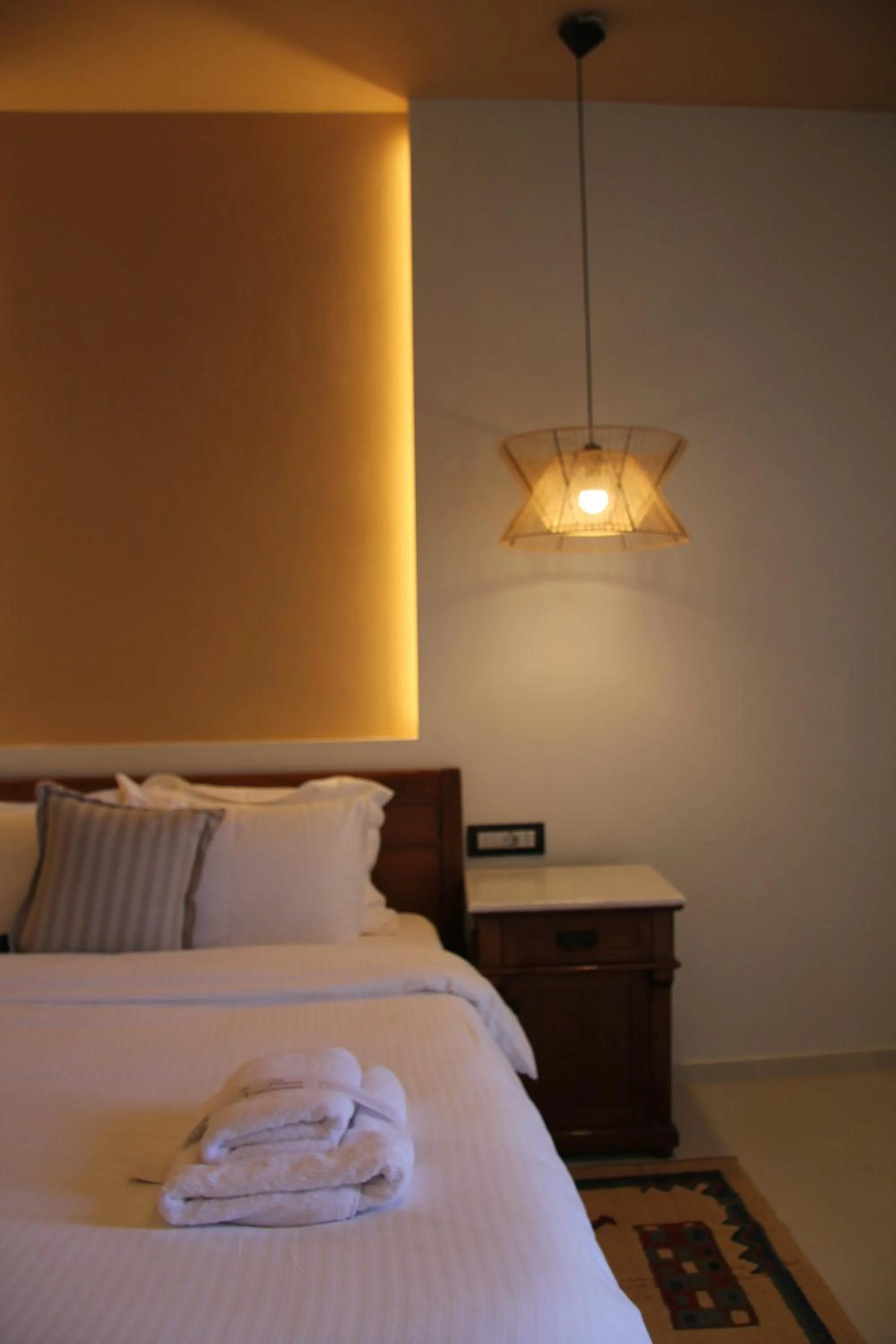 Bed in The Flower Of Monemvasia Hotel