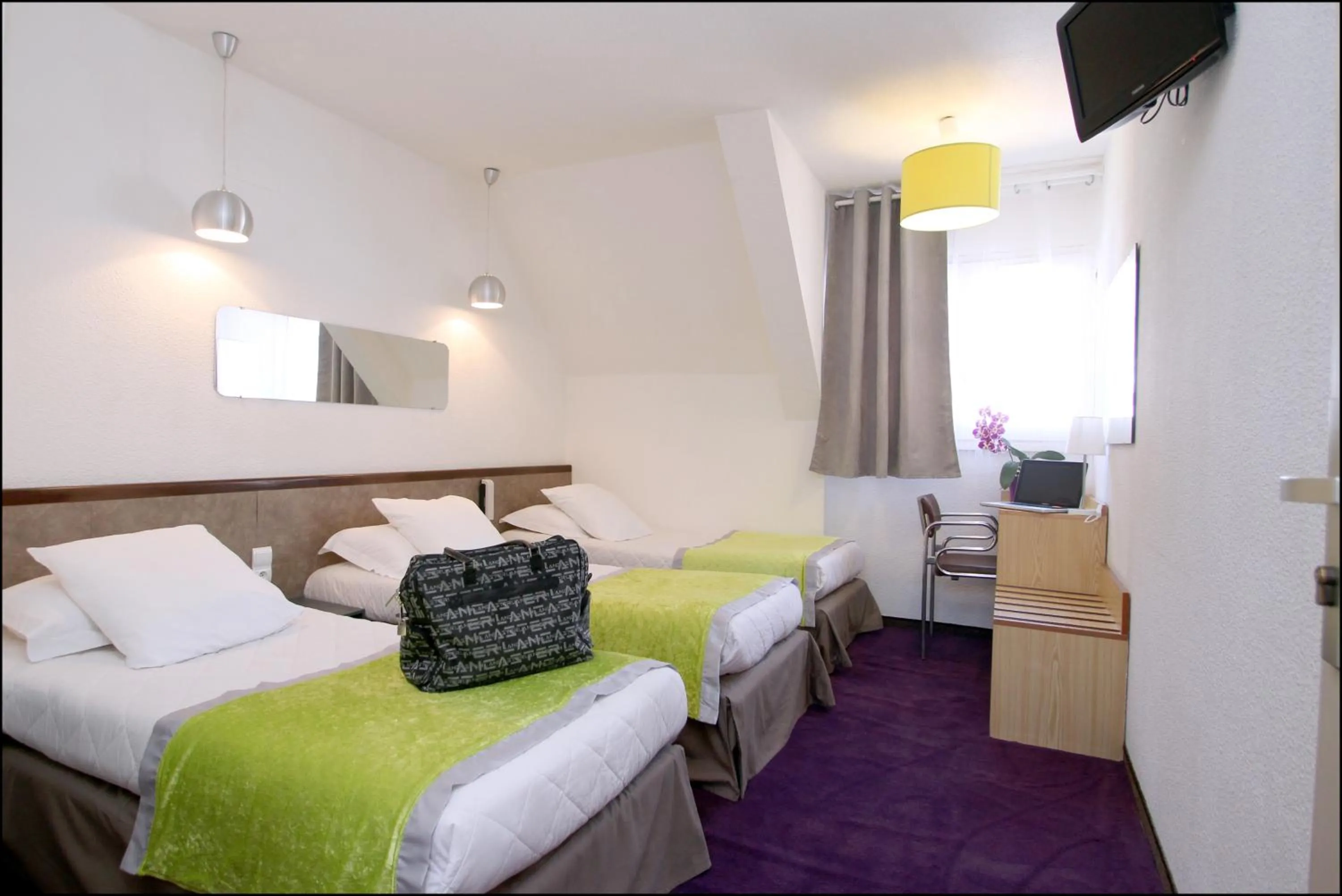 Photo of the whole room, Bed in Hôtel Peyramale