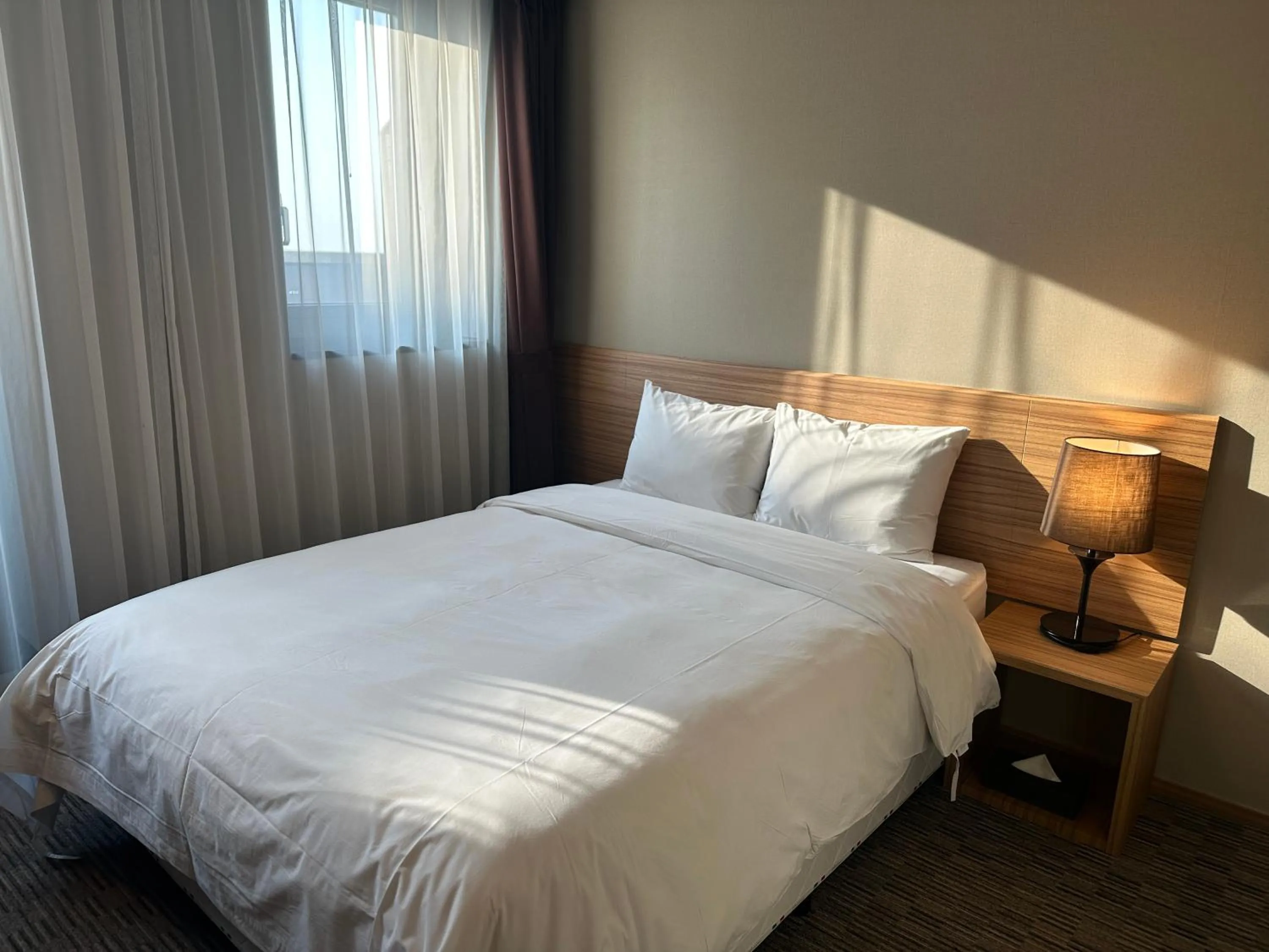 Bed in Golden Harbor Hotel Pyeongtaek
