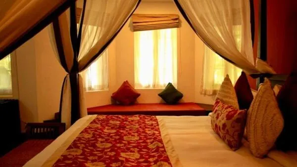 Bed in Old Lighthouse Bristow Hotel , Fort Kochi