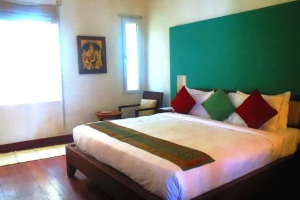 Bed in Old Lighthouse Bristow Hotel , Fort Kochi