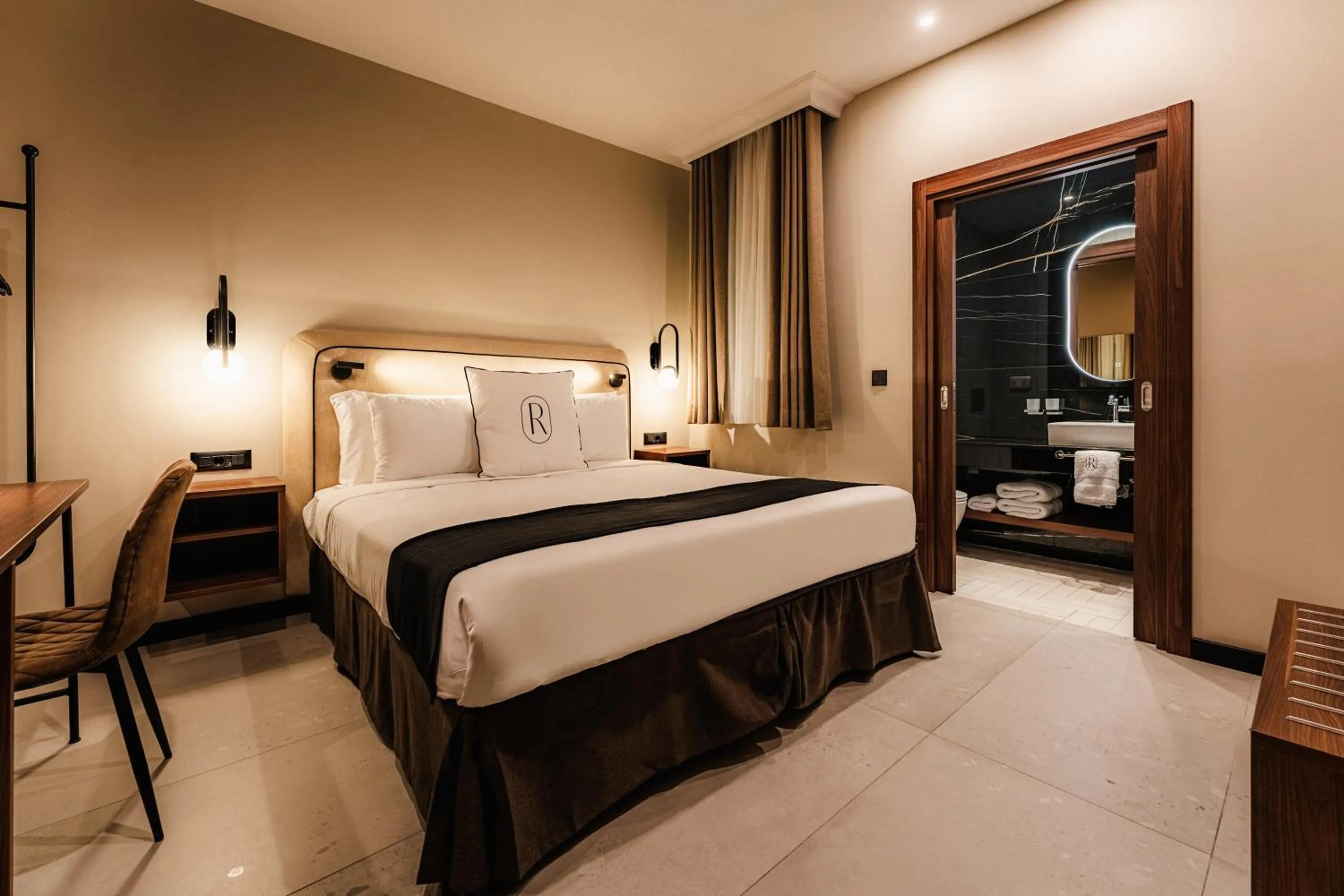 Bed in Royale Sainte Hélène Boutique Hotel