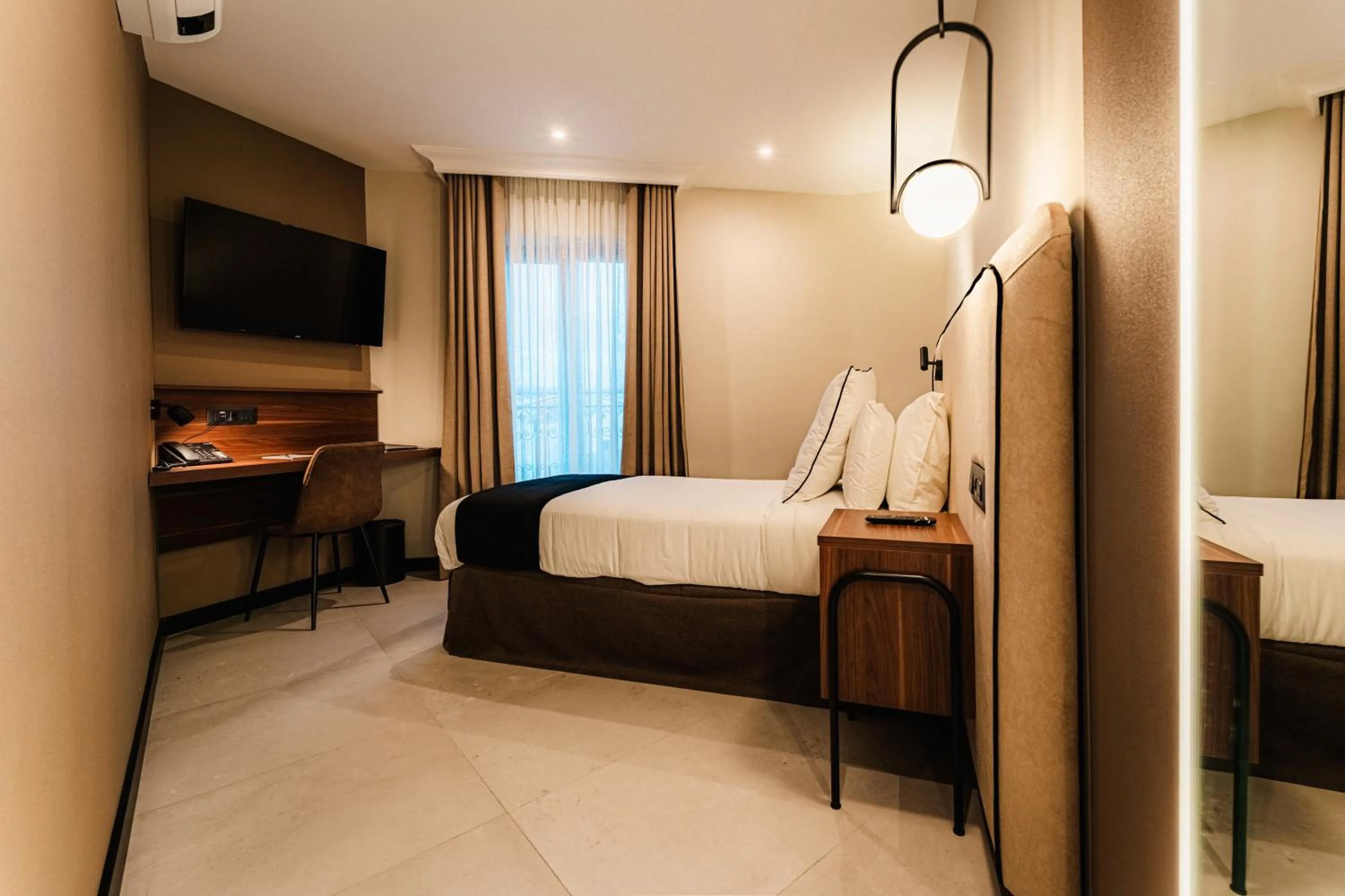 Bed in Royale Sainte Hélène Boutique Hotel