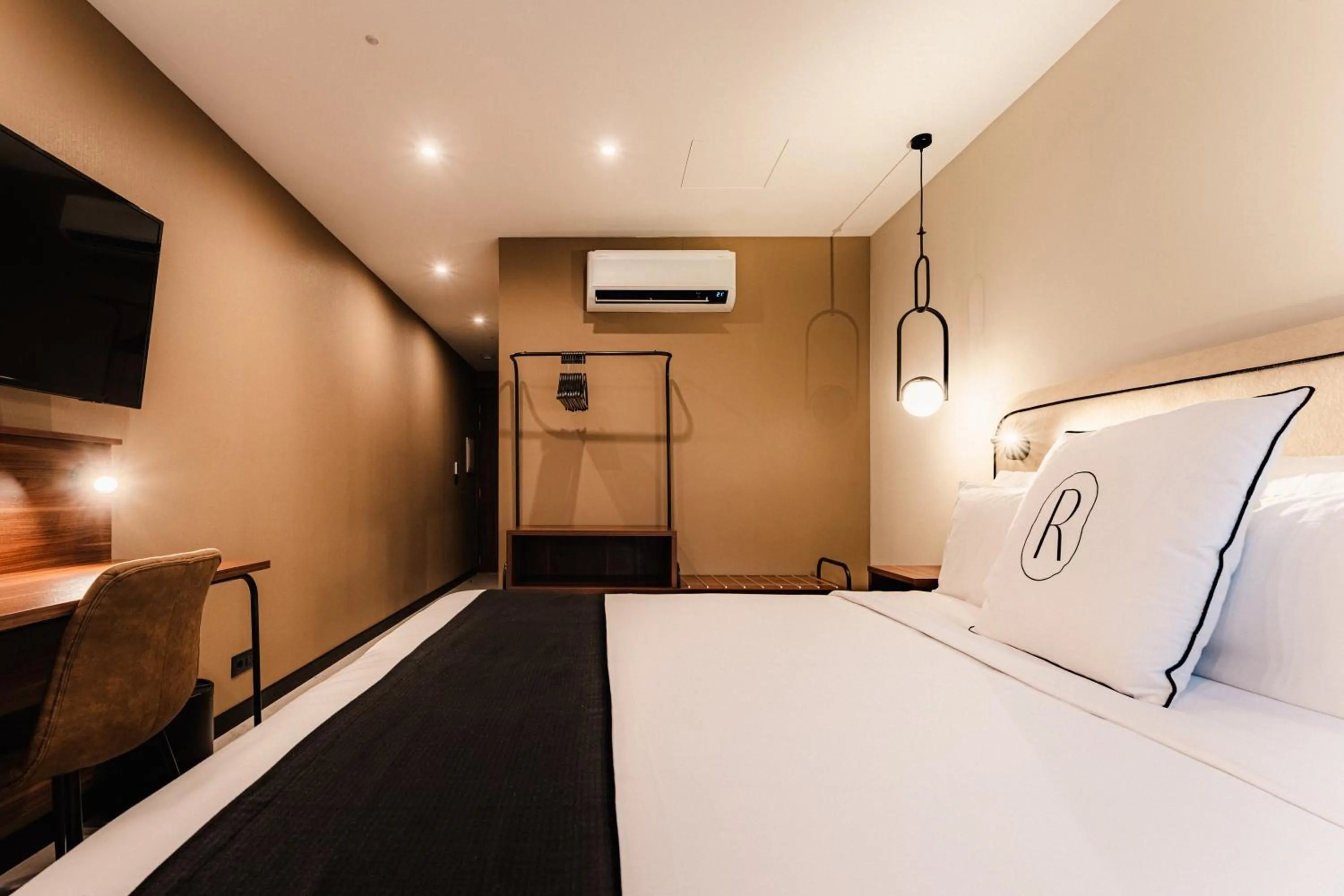 Bed in Royale Sainte Hélène Boutique Hotel