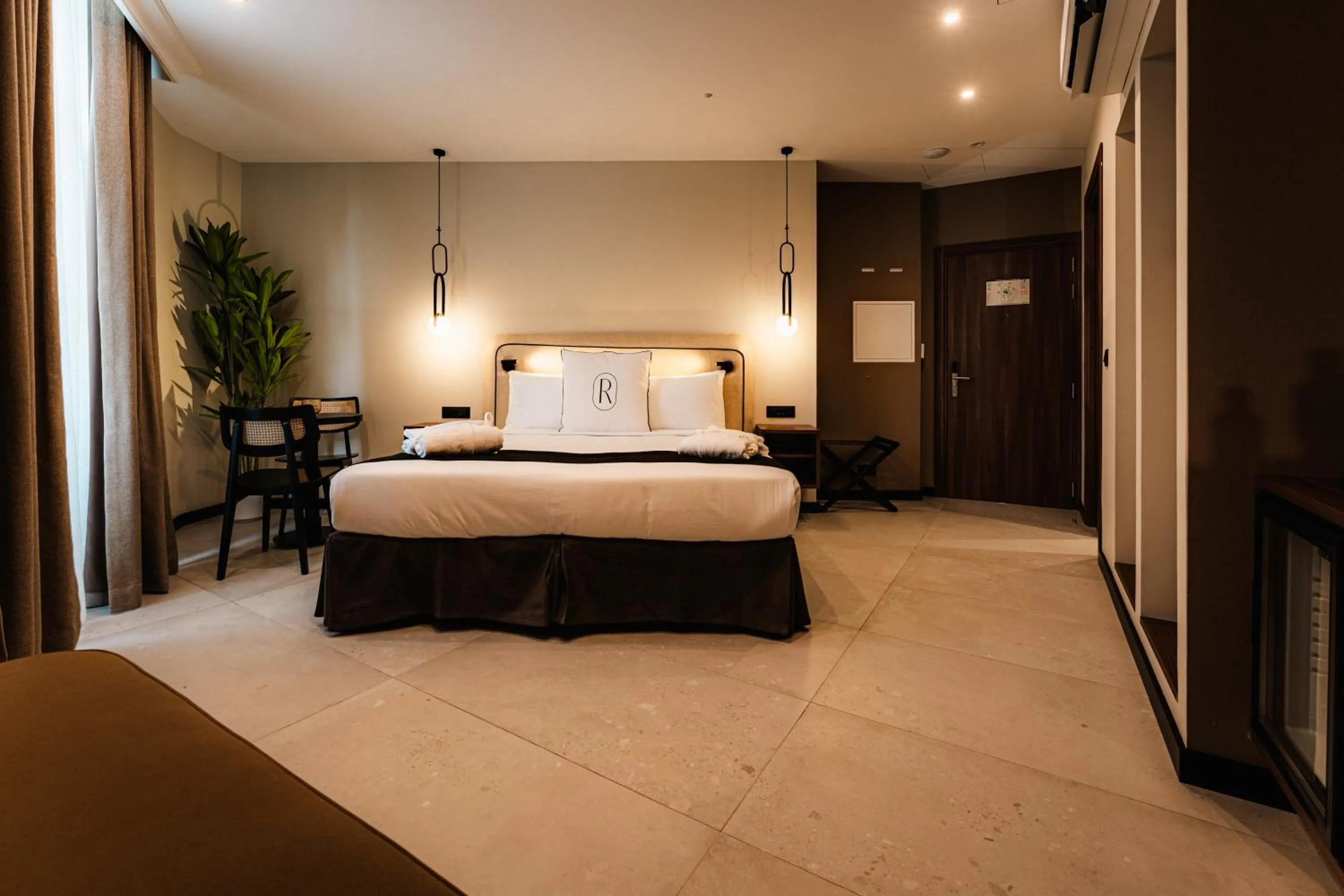 Bed in Royale Sainte Hélène Boutique Hotel