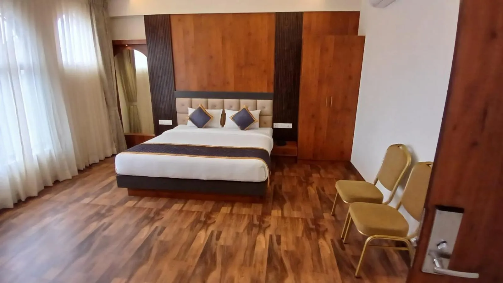 Bed in PPH Living Rajathagiri Palace Premium Rooms