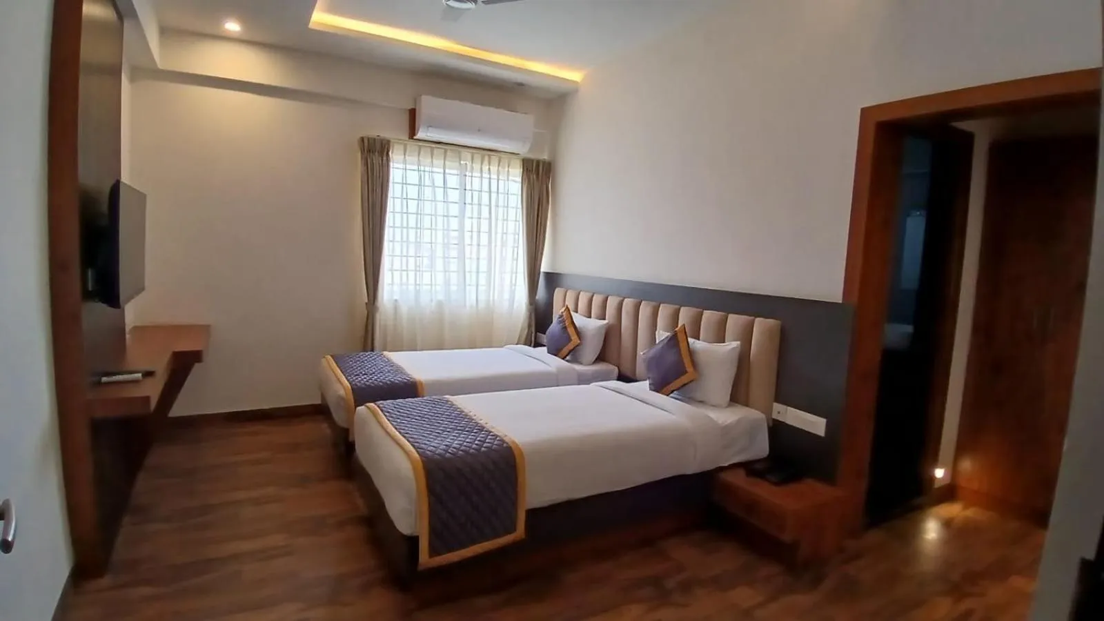 Bed in PPH Living Rajathagiri Palace Premium Rooms
