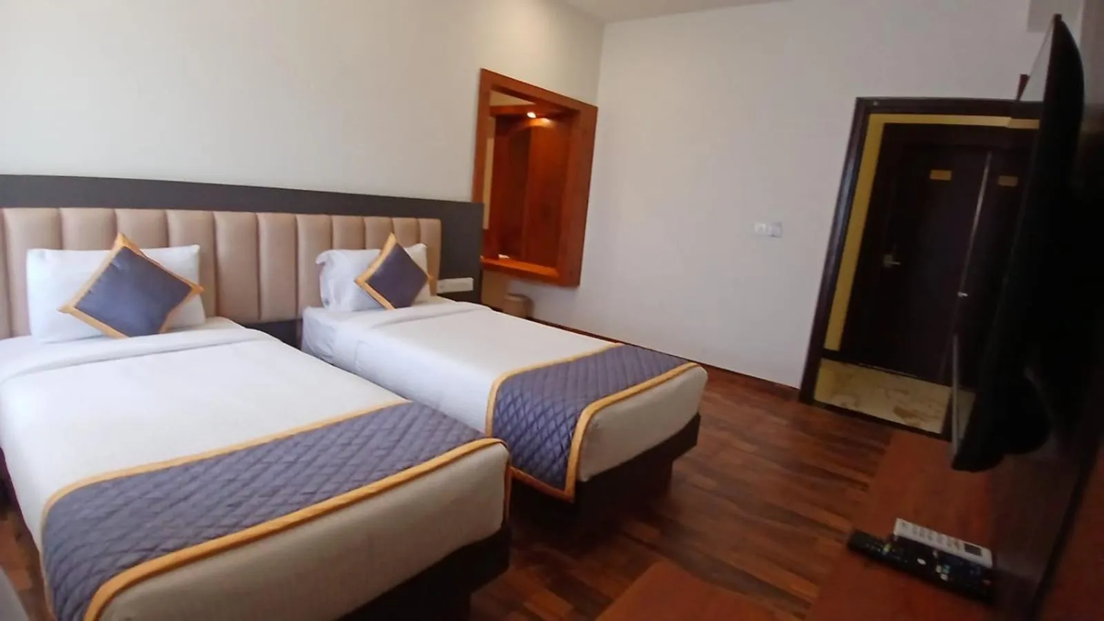 Bed in PPH Living Rajathagiri Palace Premium Rooms