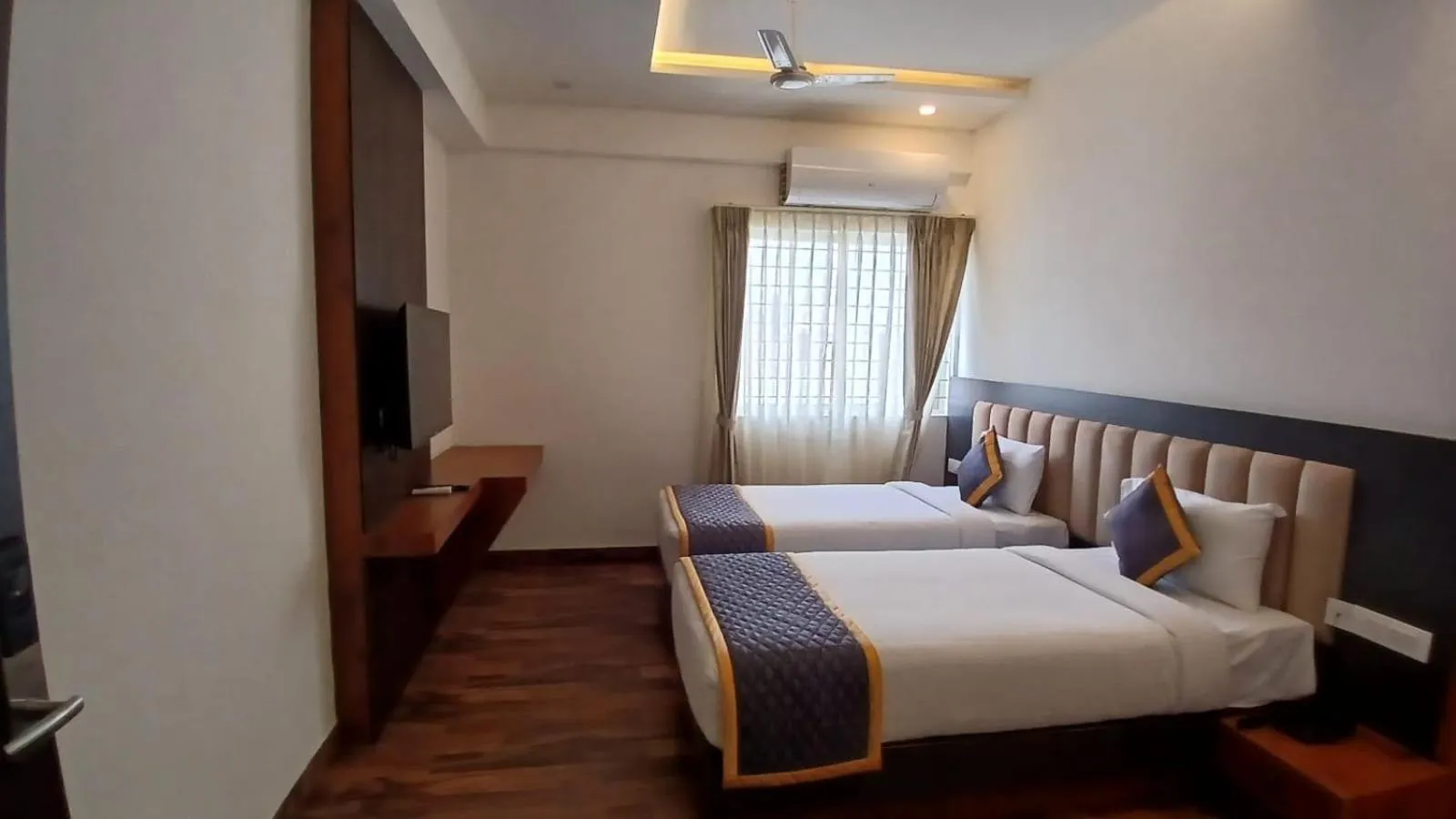 Bed in PPH Living Rajathagiri Palace Premium Rooms