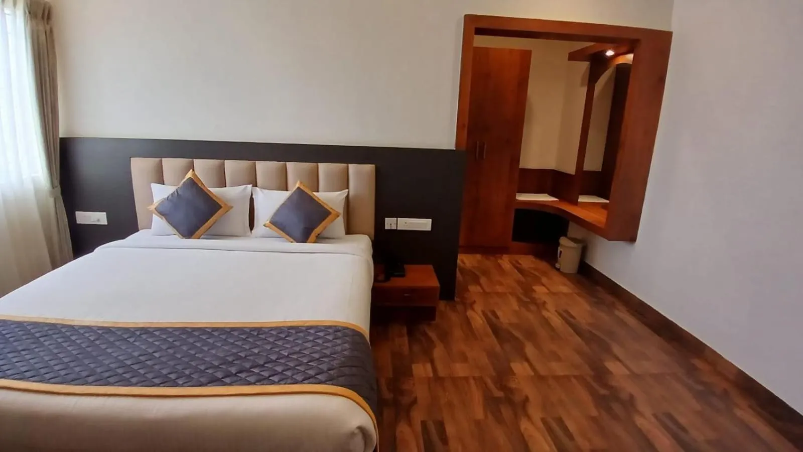 Bed in PPH Living Rajathagiri Palace Premium Rooms