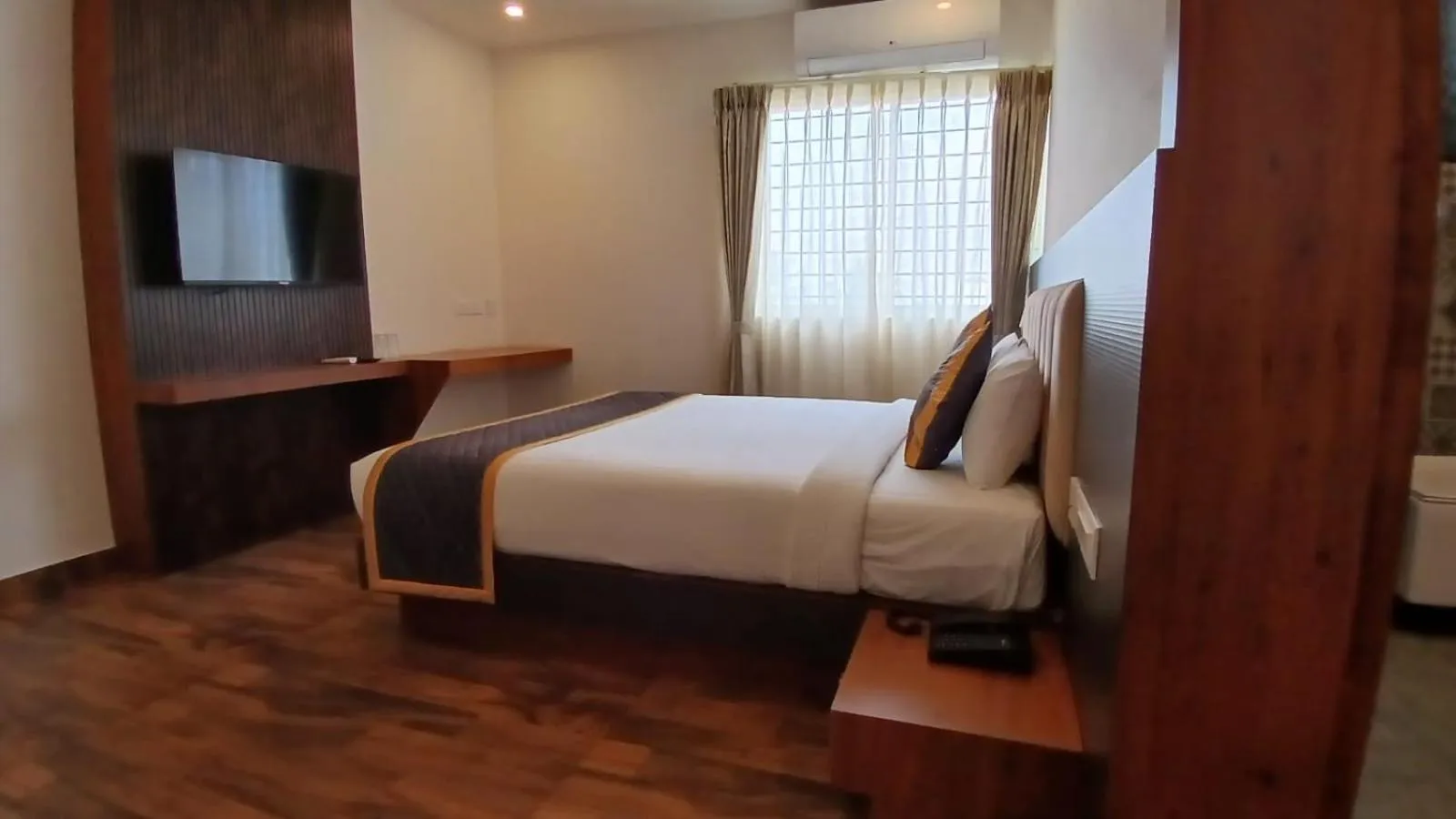 Bed in PPH Living Rajathagiri Palace Premium Rooms