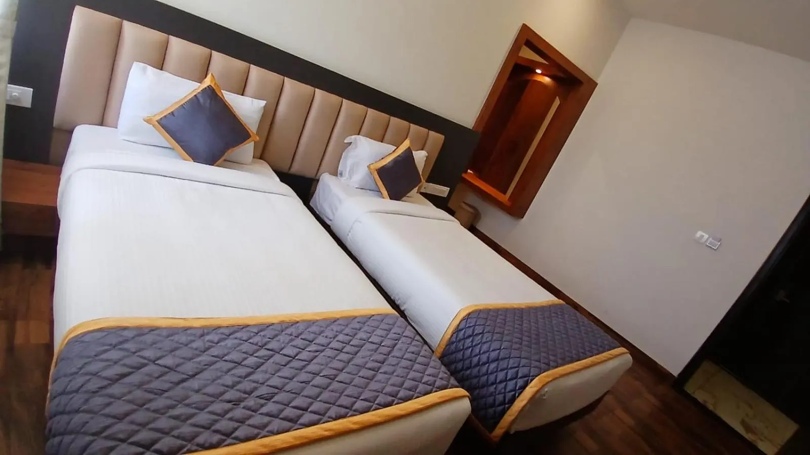 Bed in PPH Living Rajathagiri Palace Premium Rooms