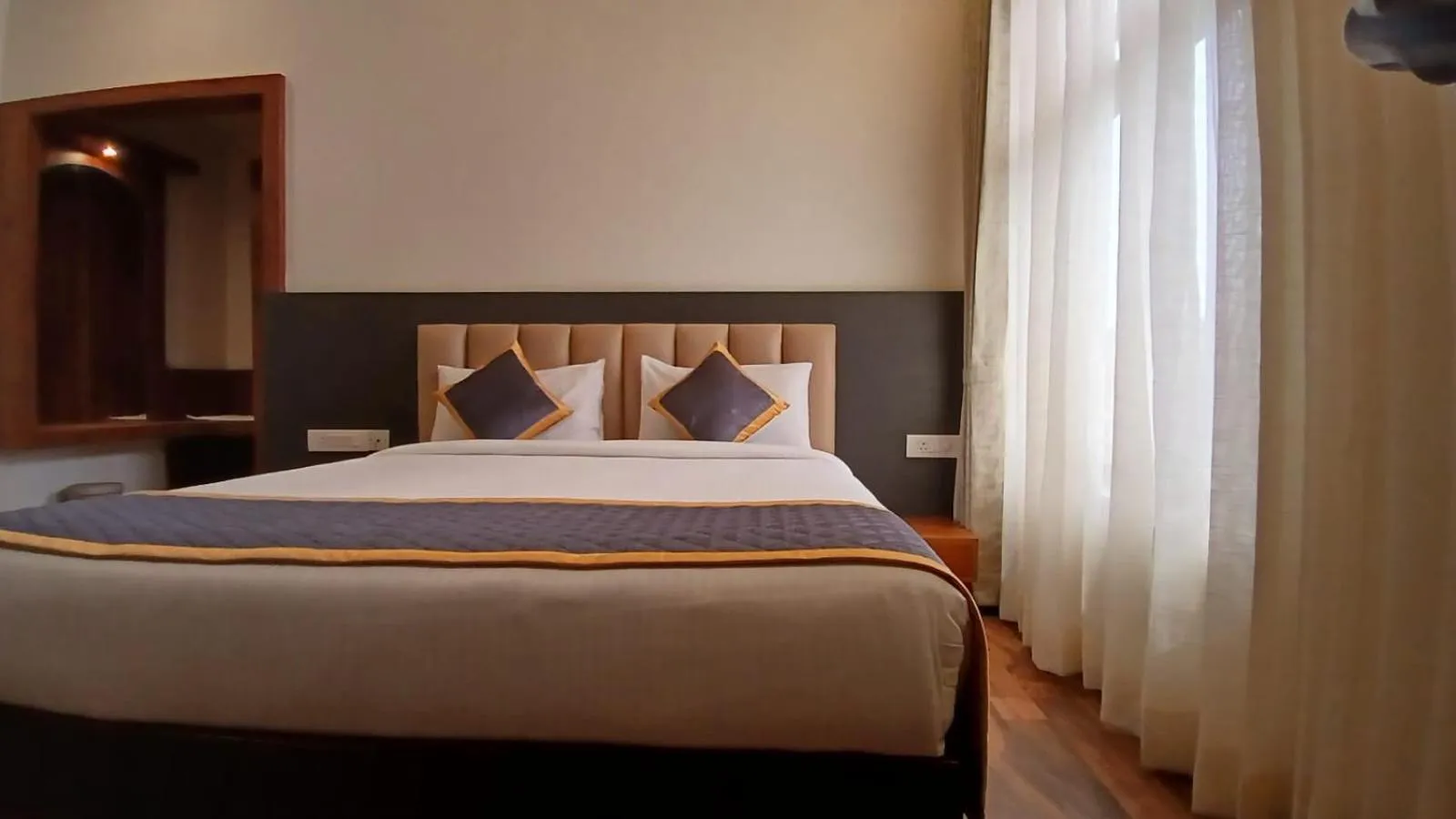 Bed in PPH Living Rajathagiri Palace Premium Rooms