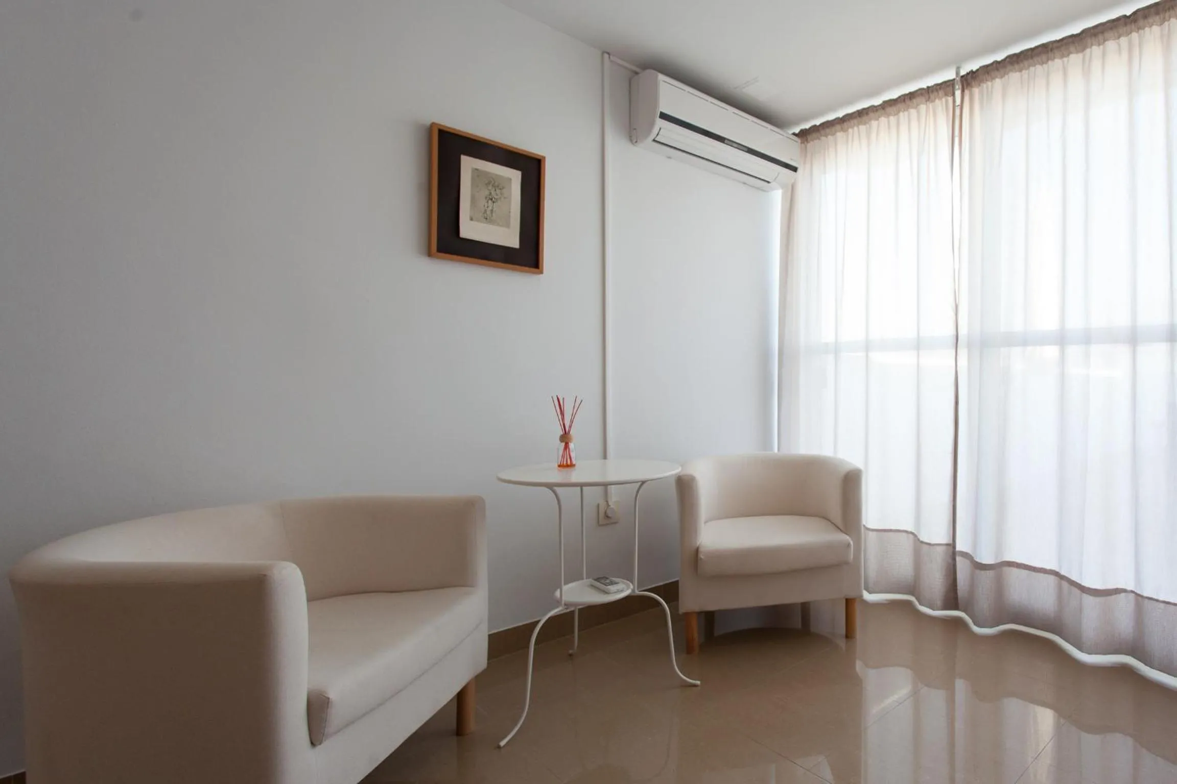Seating area in Apartamentos Diaber San Leandro