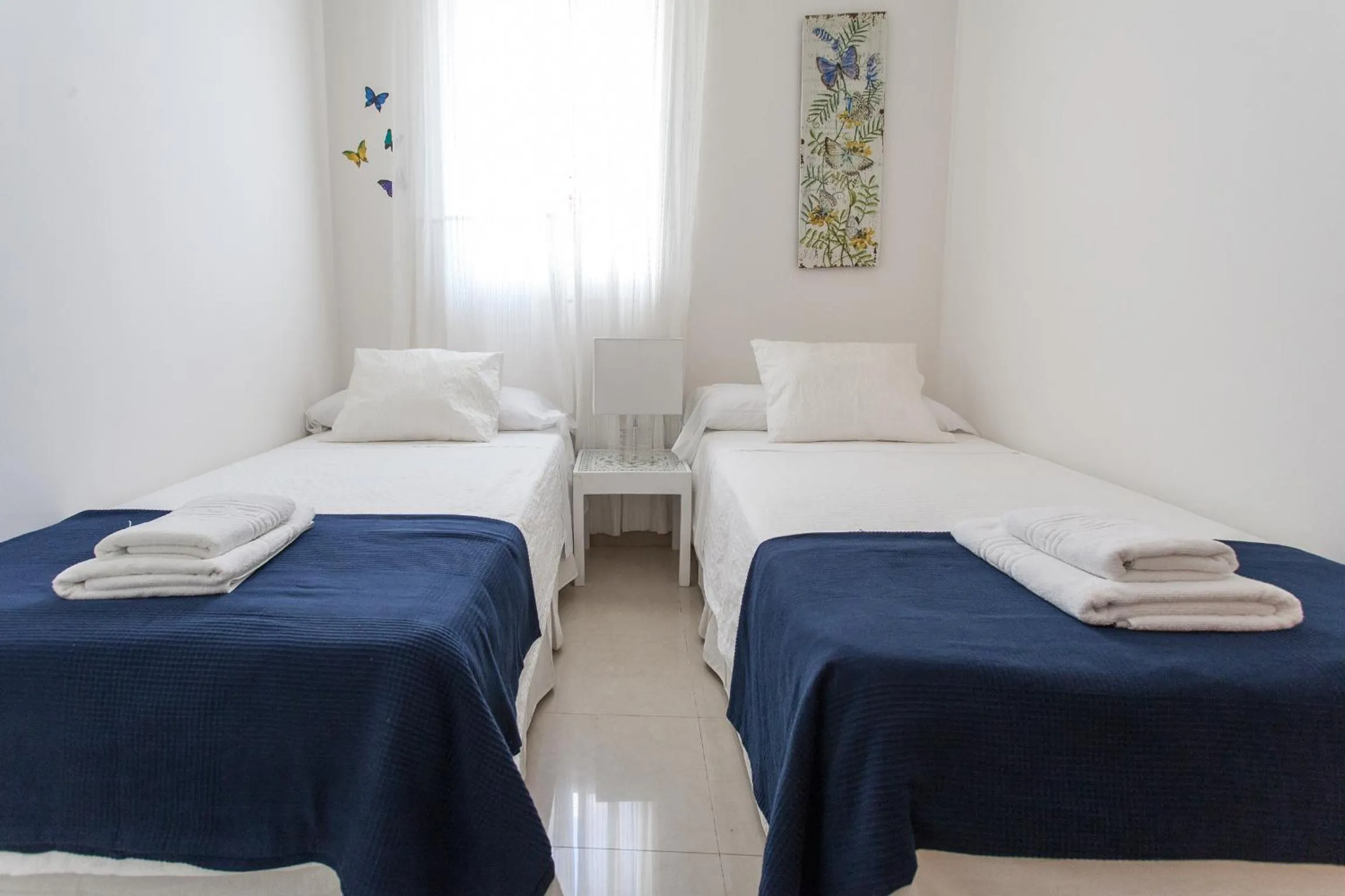 Bedroom, Bed in Apartamentos Diaber San Leandro