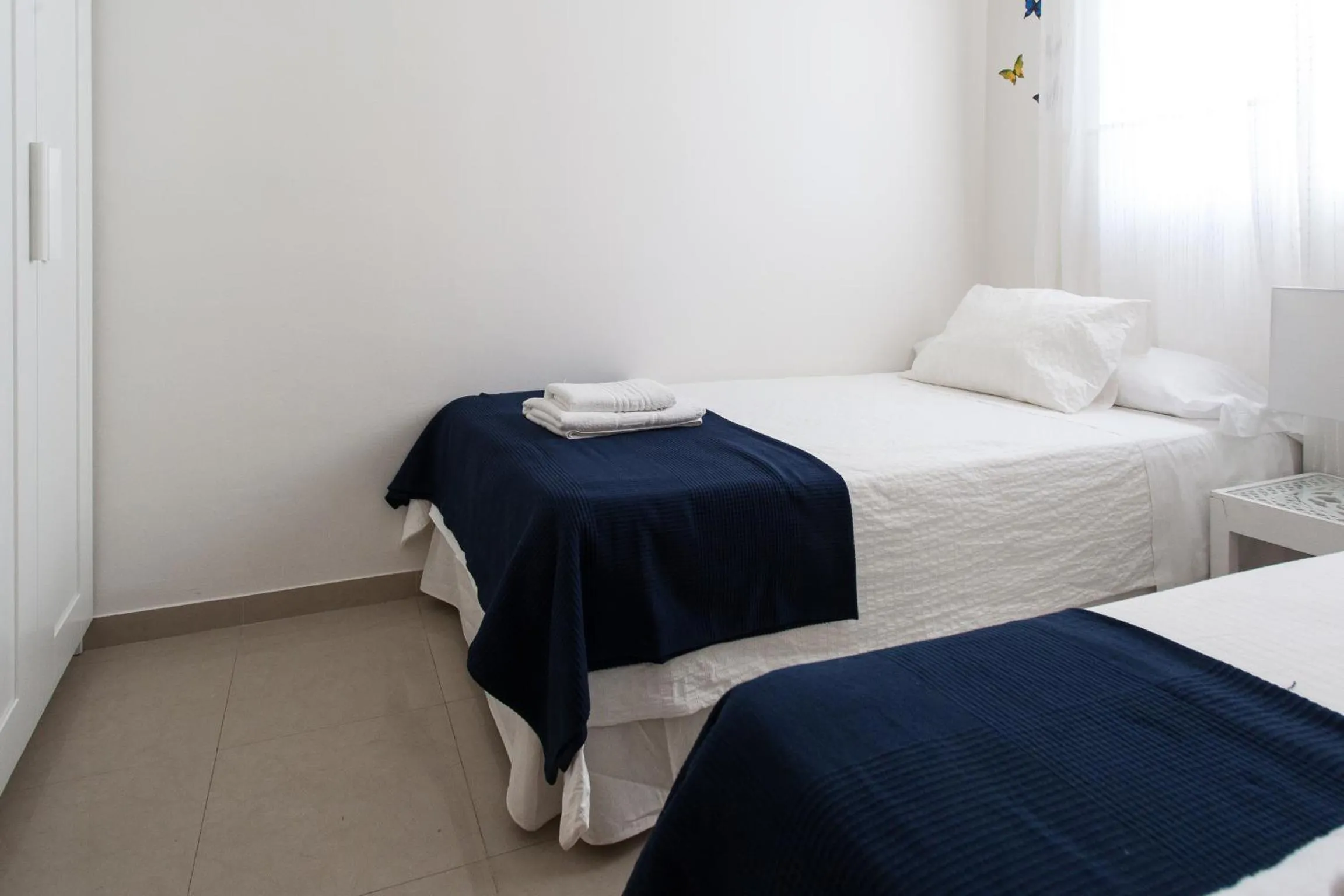 Bedroom, Bed in Apartamentos Diaber San Leandro