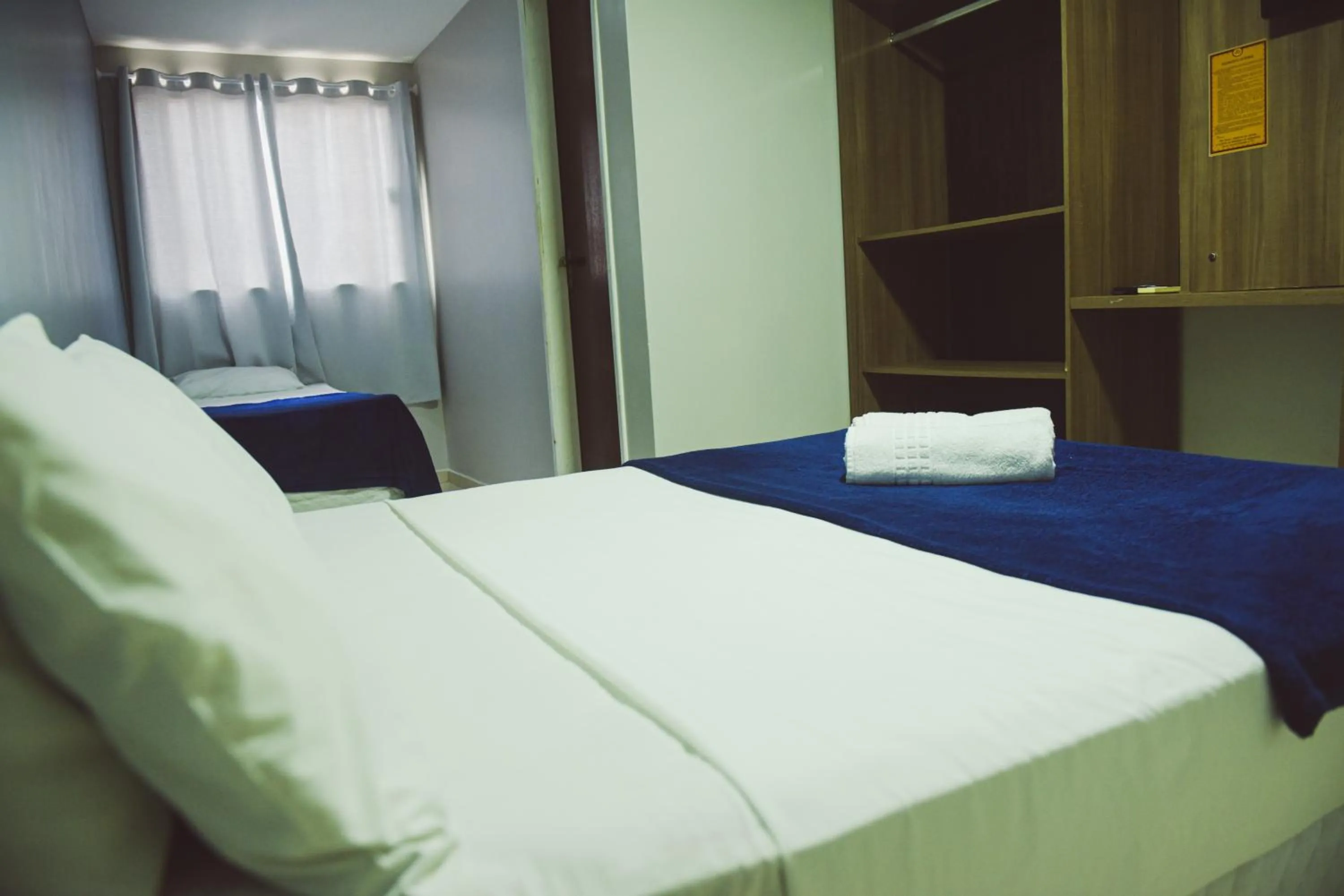 Bed in Pousada Xerxes