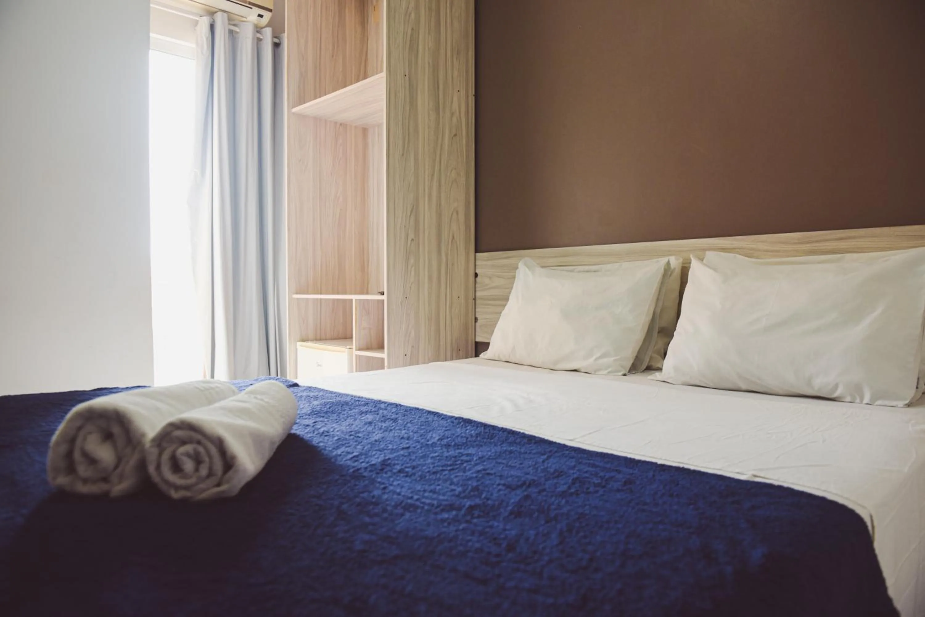 Bed in Pousada Xerxes