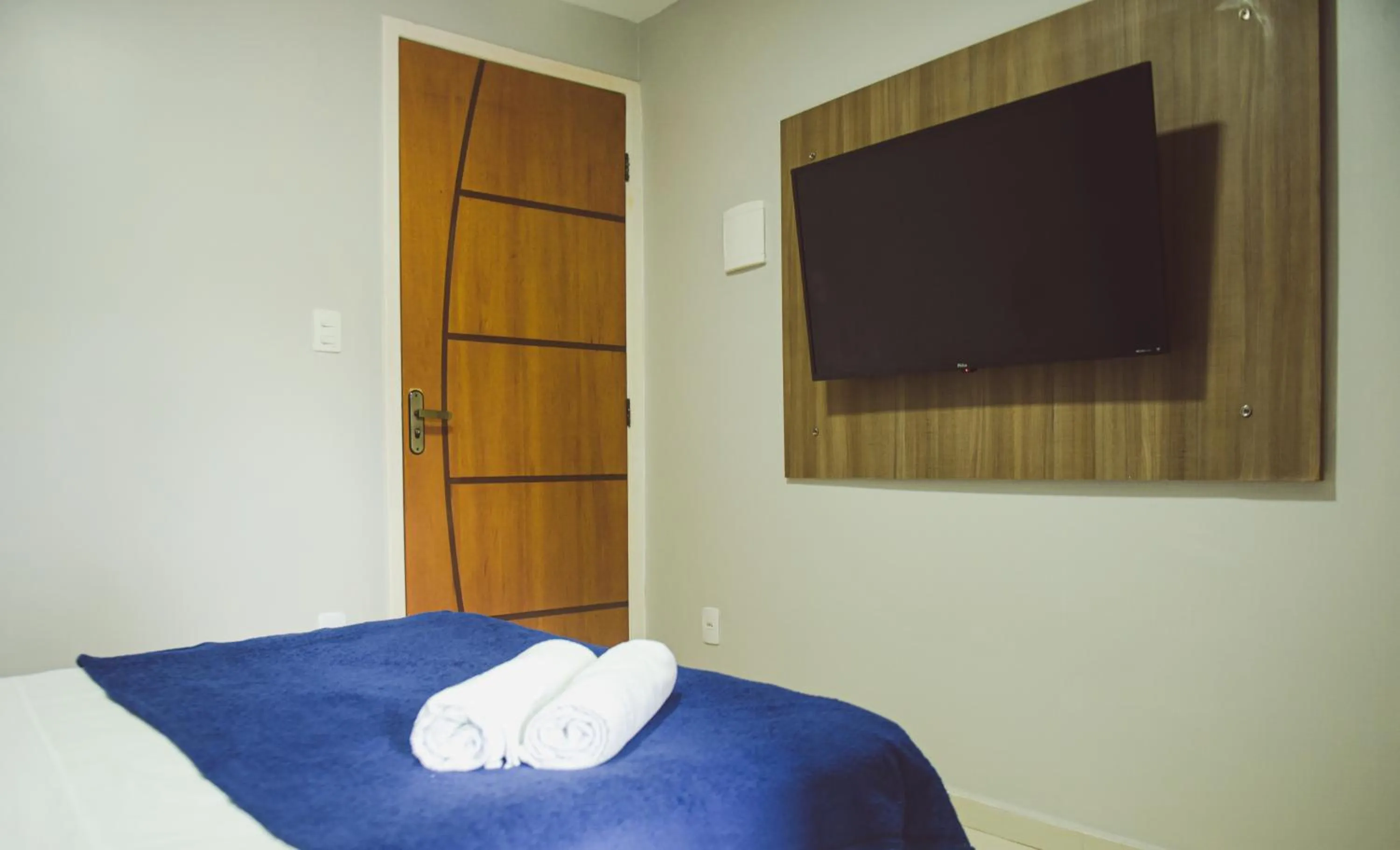 Bed in Pousada Xerxes