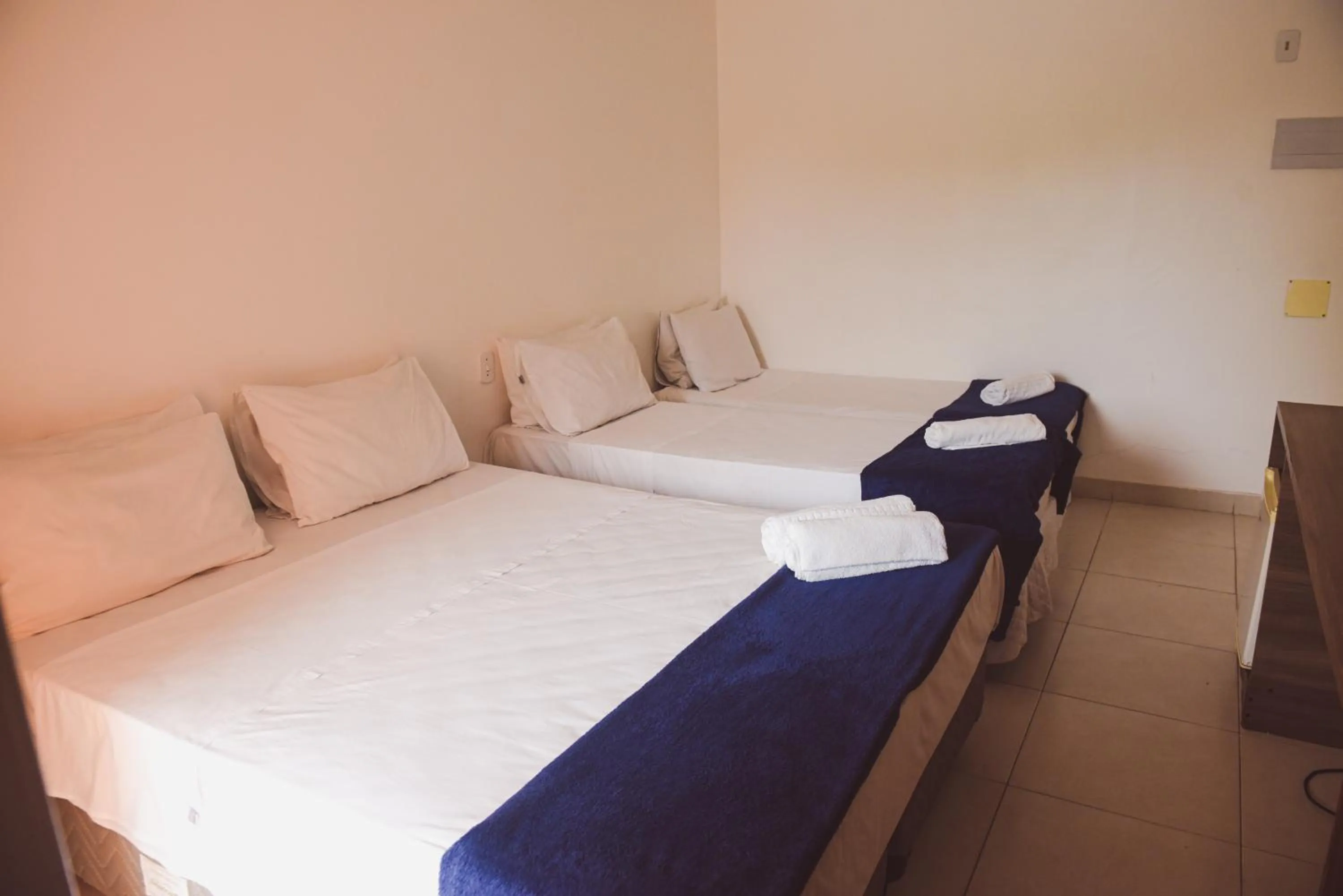 Bed in Pousada Xerxes