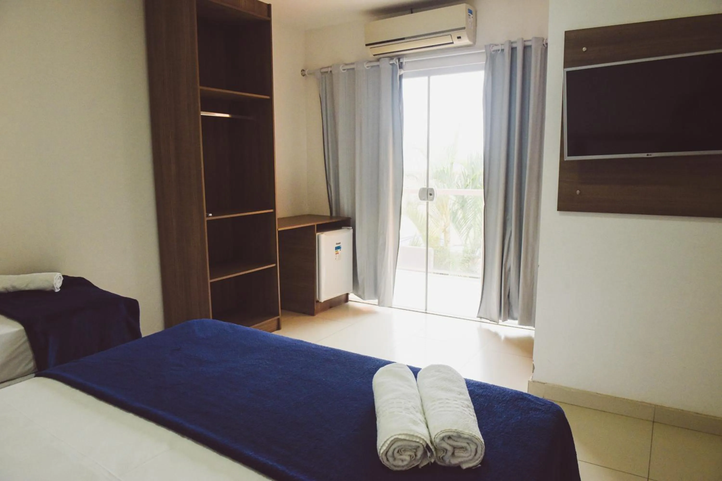 Bed in Pousada Xerxes