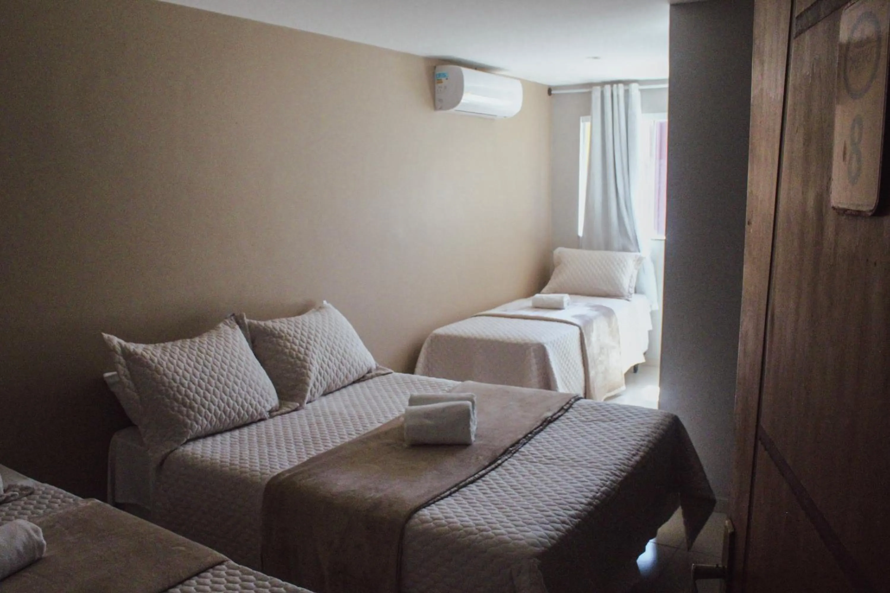 Bed in Pousada Xerxes