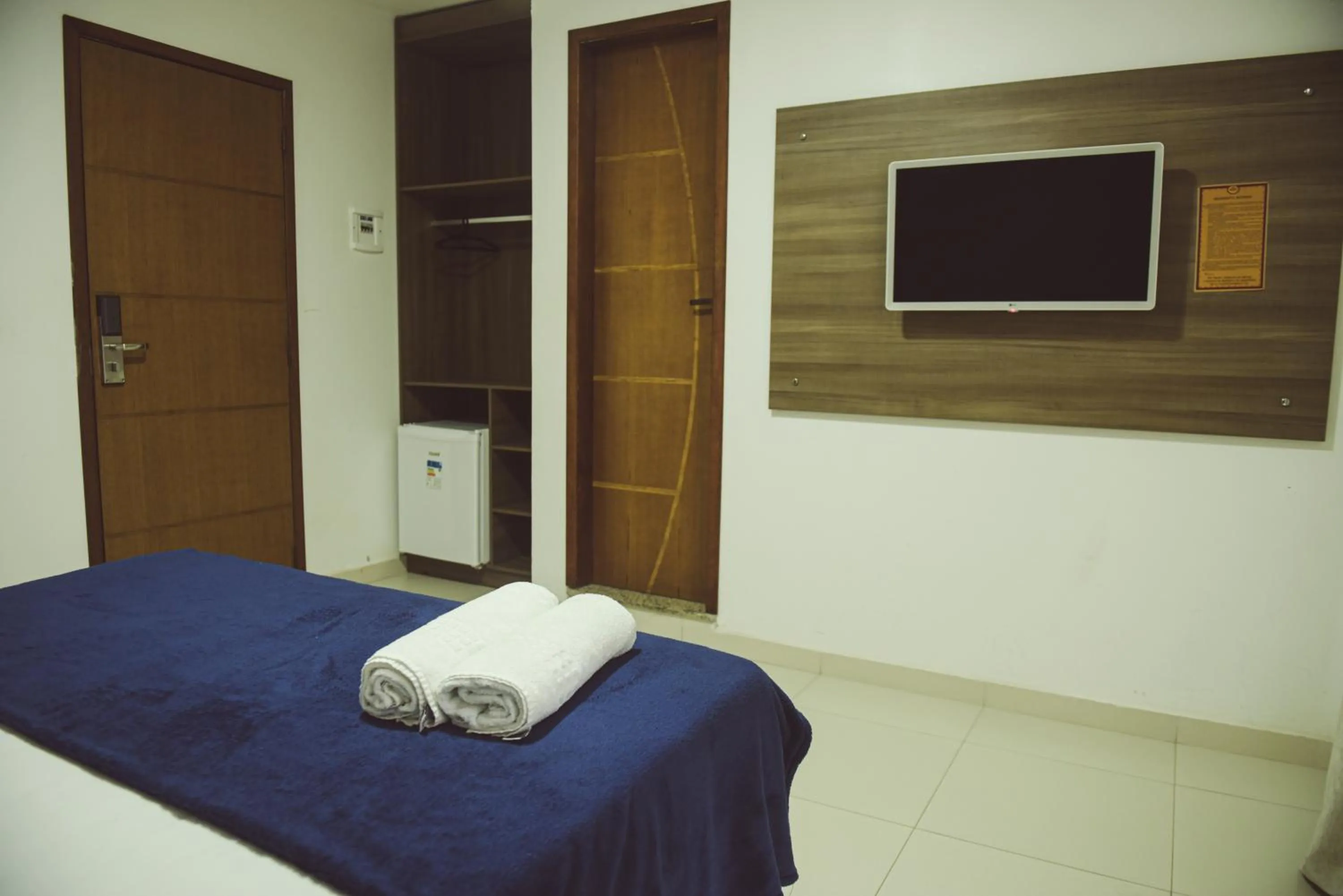 Bed in Pousada Xerxes