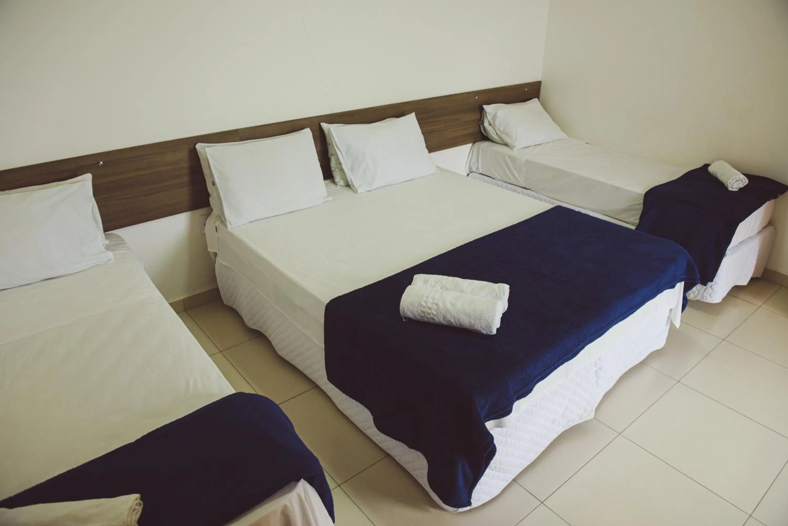 Bed in Pousada Xerxes