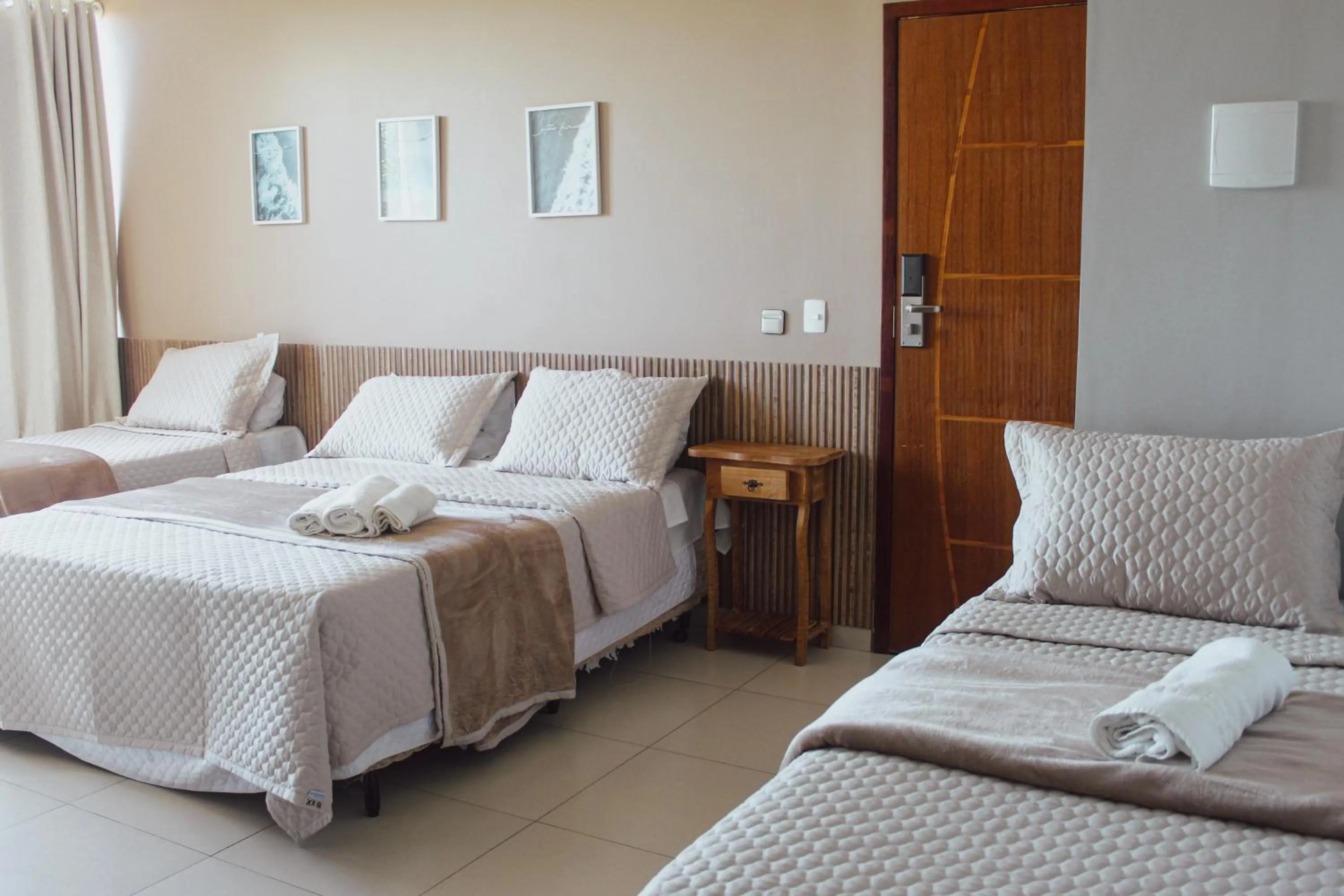 Bed in Pousada Xerxes