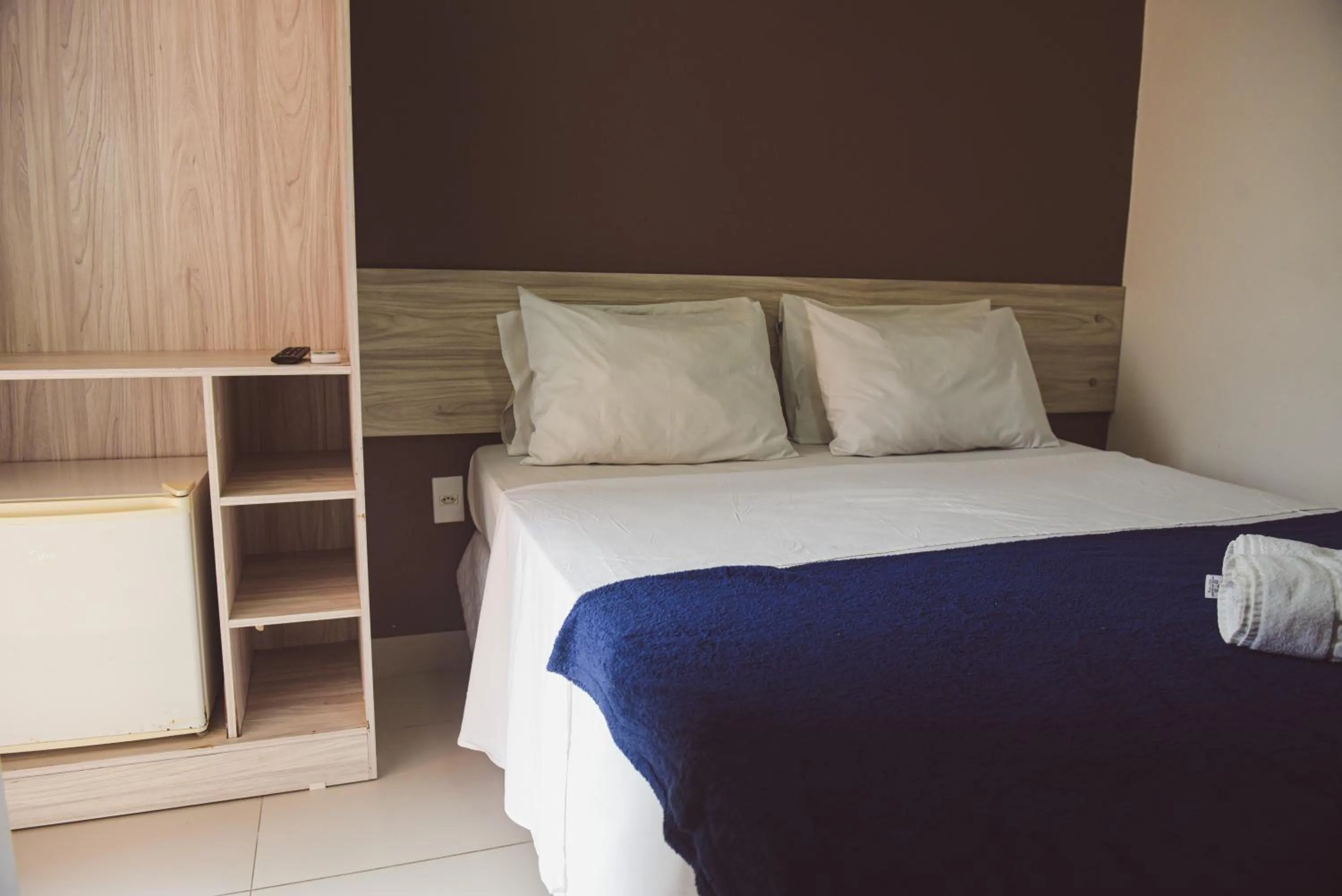 Bed in Pousada Xerxes