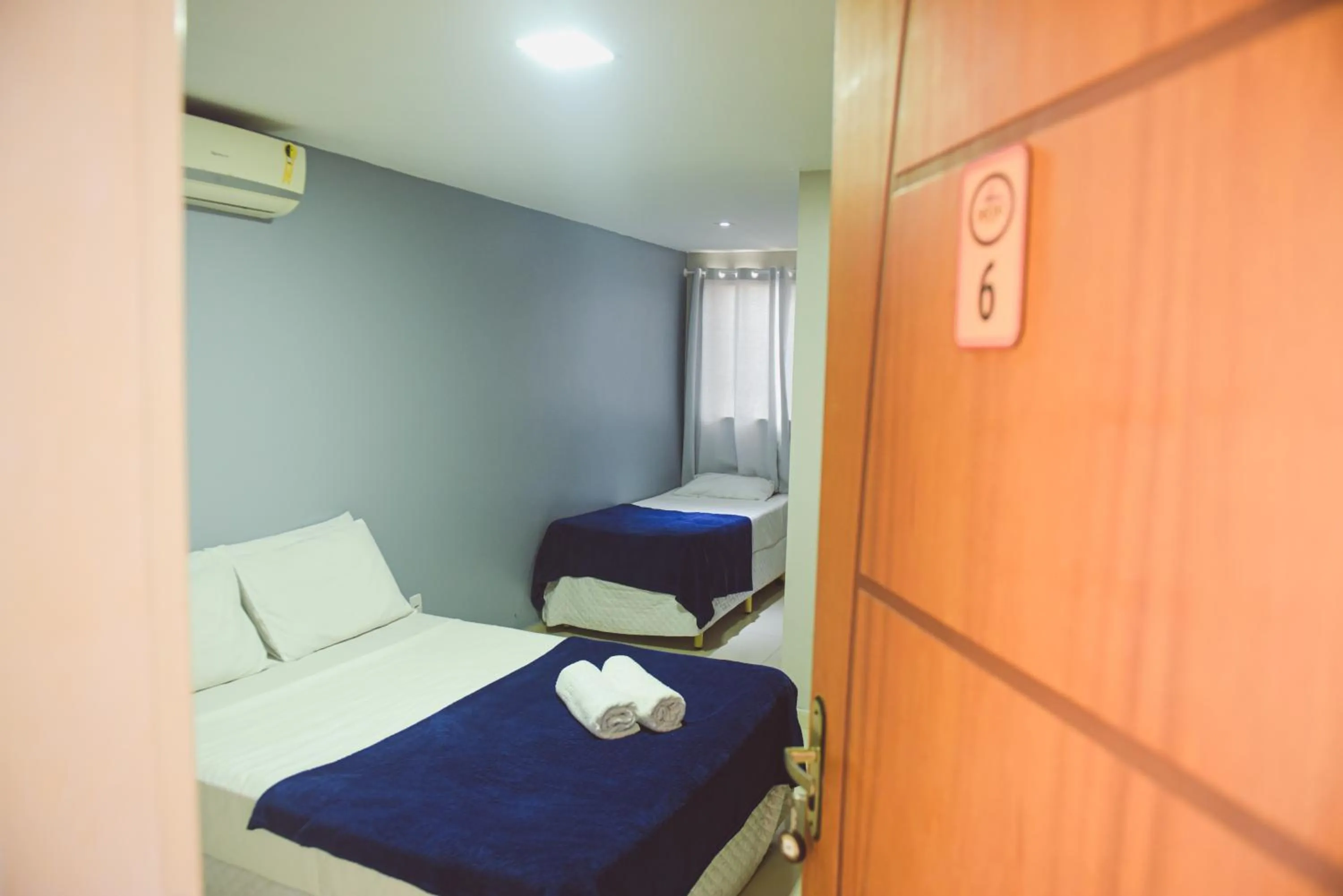 Bed in Pousada Xerxes