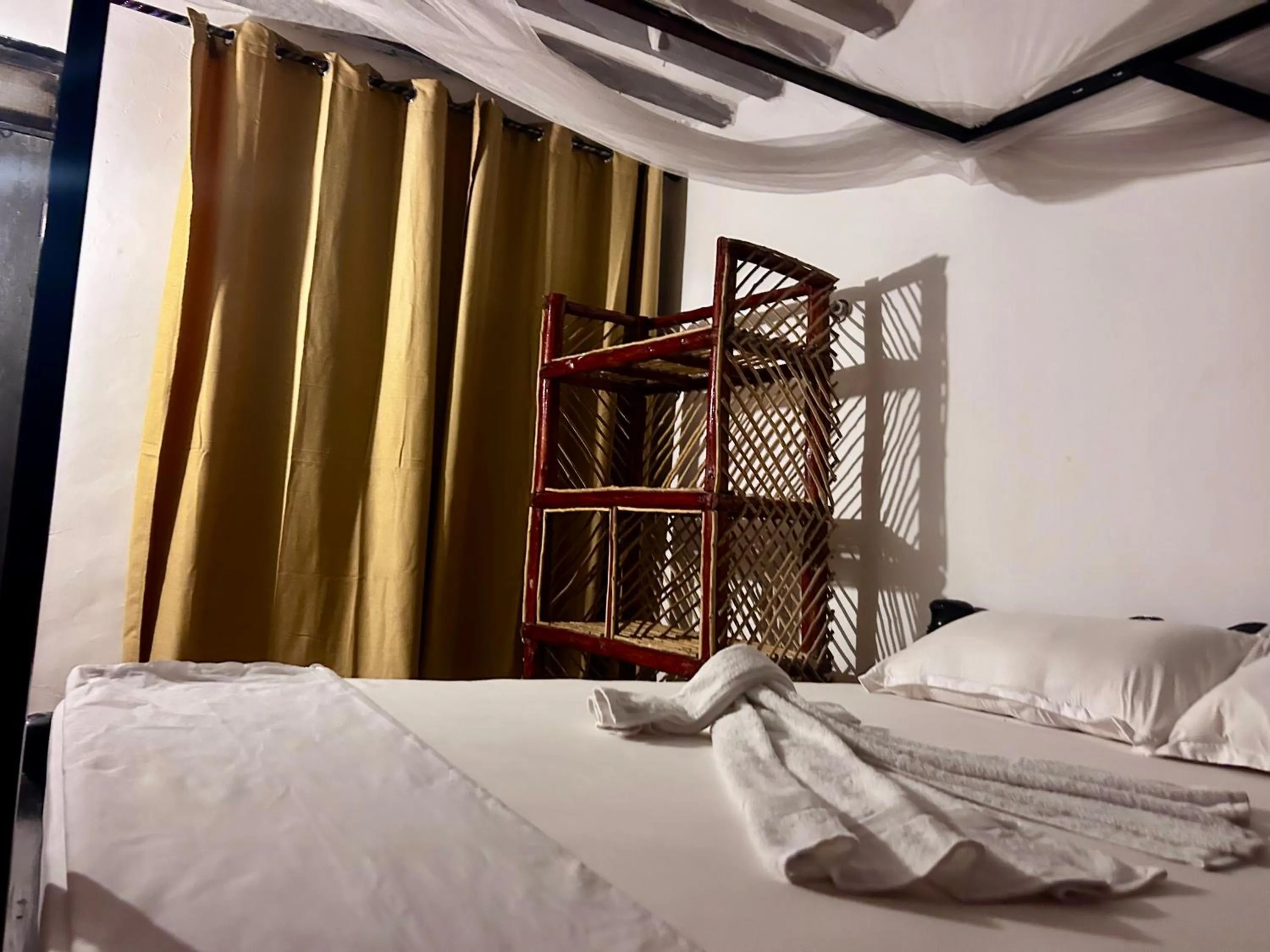 Bedroom, Bed in The Tropinest bungalow