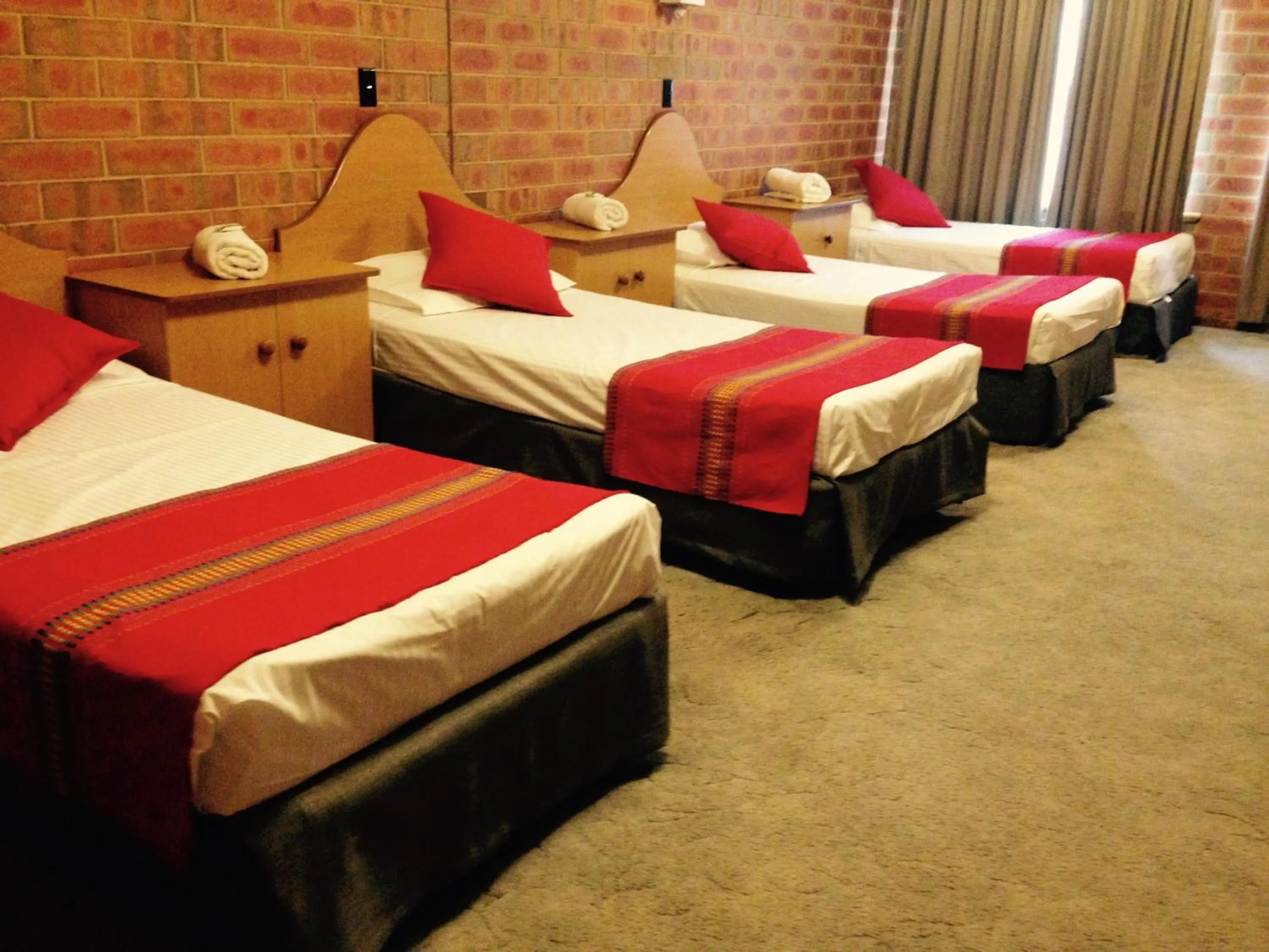 Bed in Pooraka Motor Inn