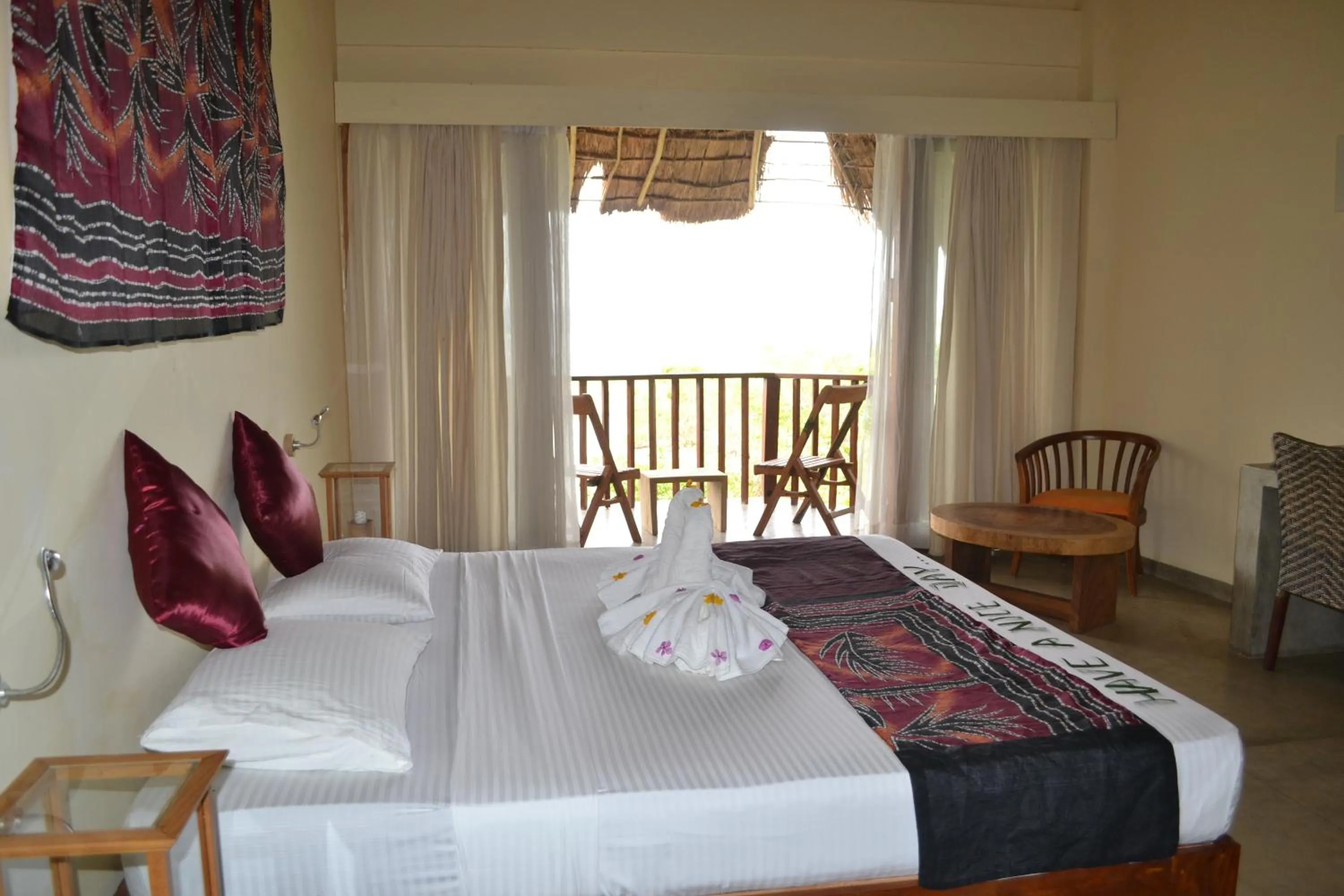 Balcony/Terrace, Bed in Giman Free Beach Resort Pasikuda