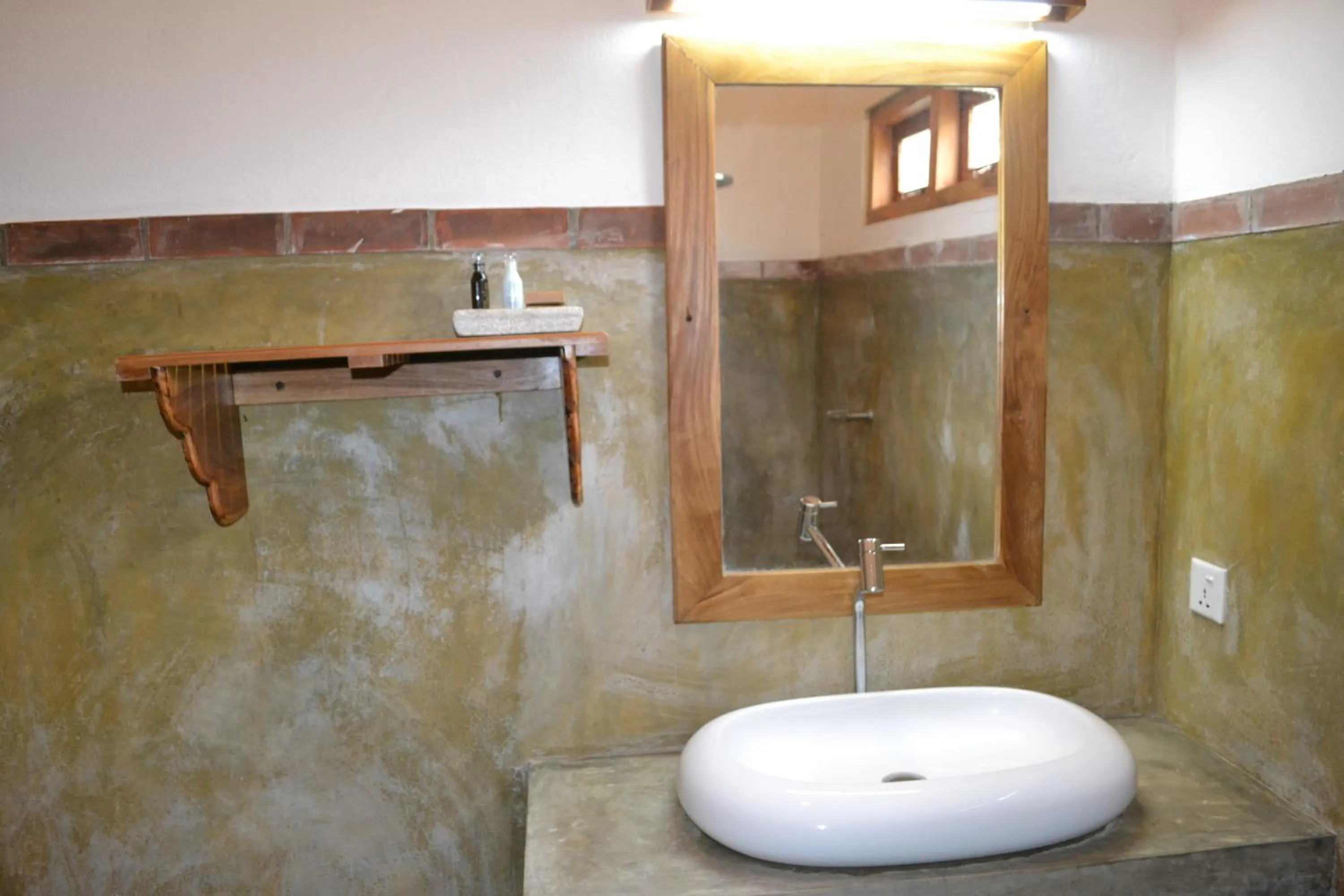 Bathroom in Giman Free Beach Resort Pasikuda