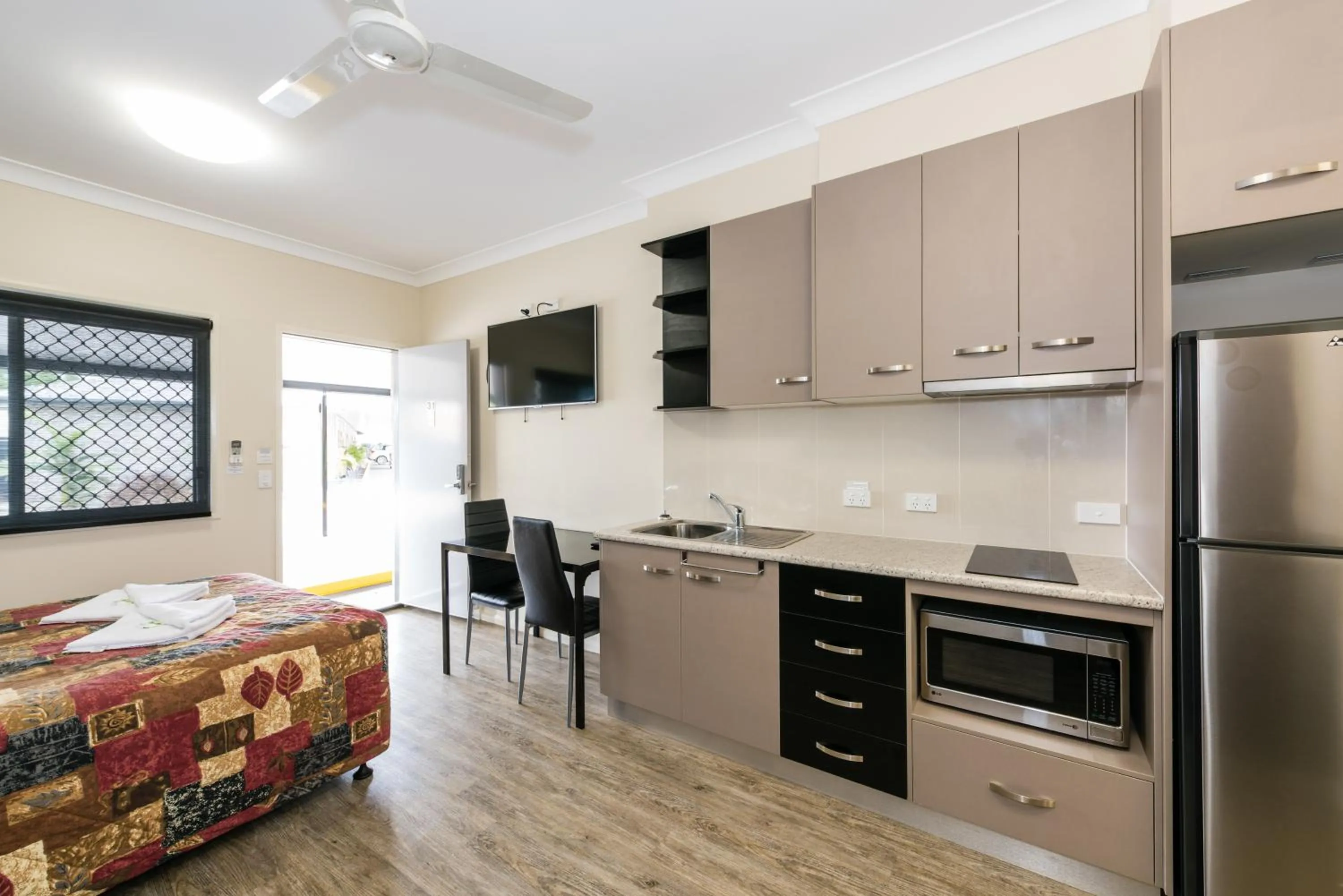 Kitchen or kitchenette, Bed in Athena Studio Units