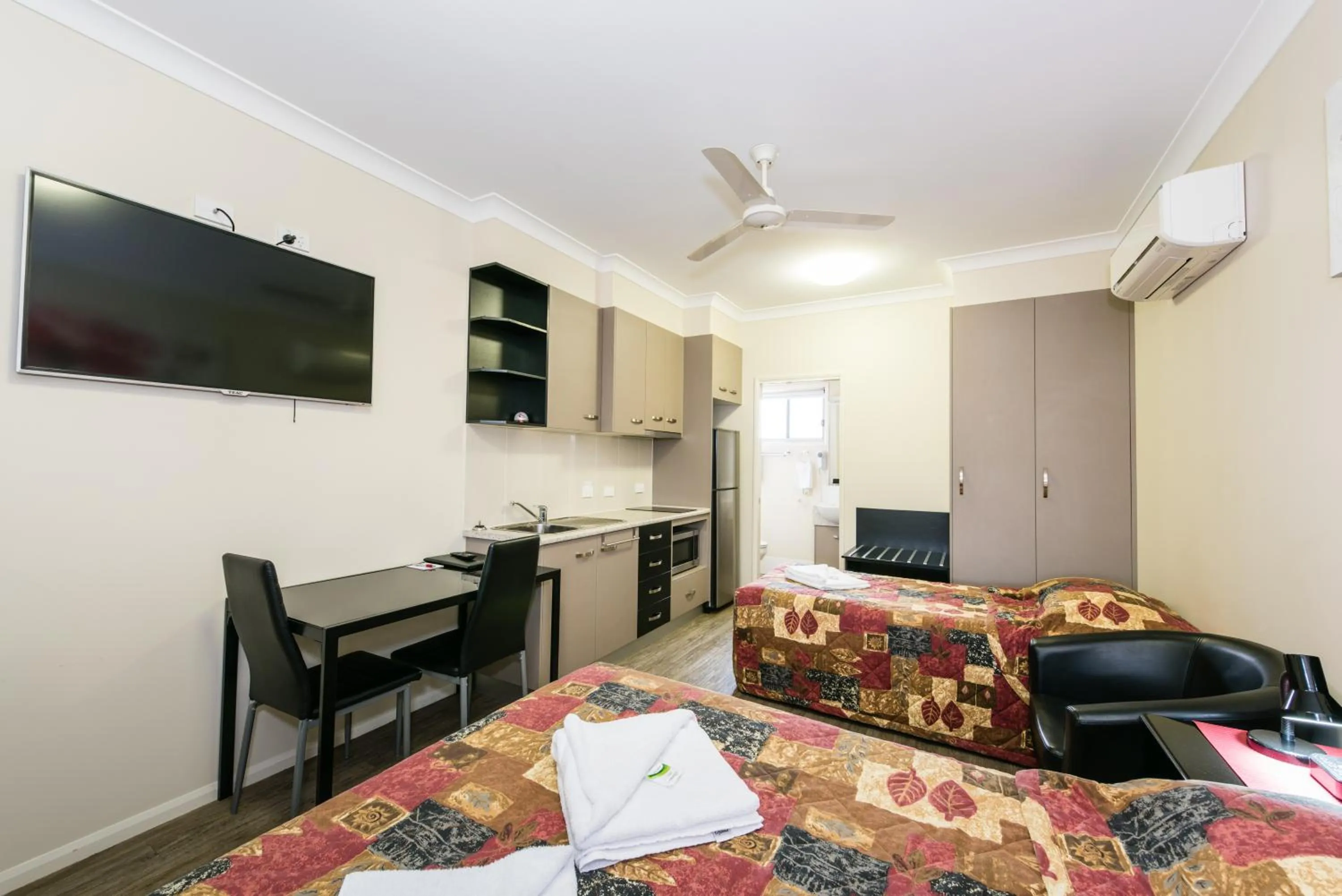 Kitchen or kitchenette, Bed in Athena Studio Units