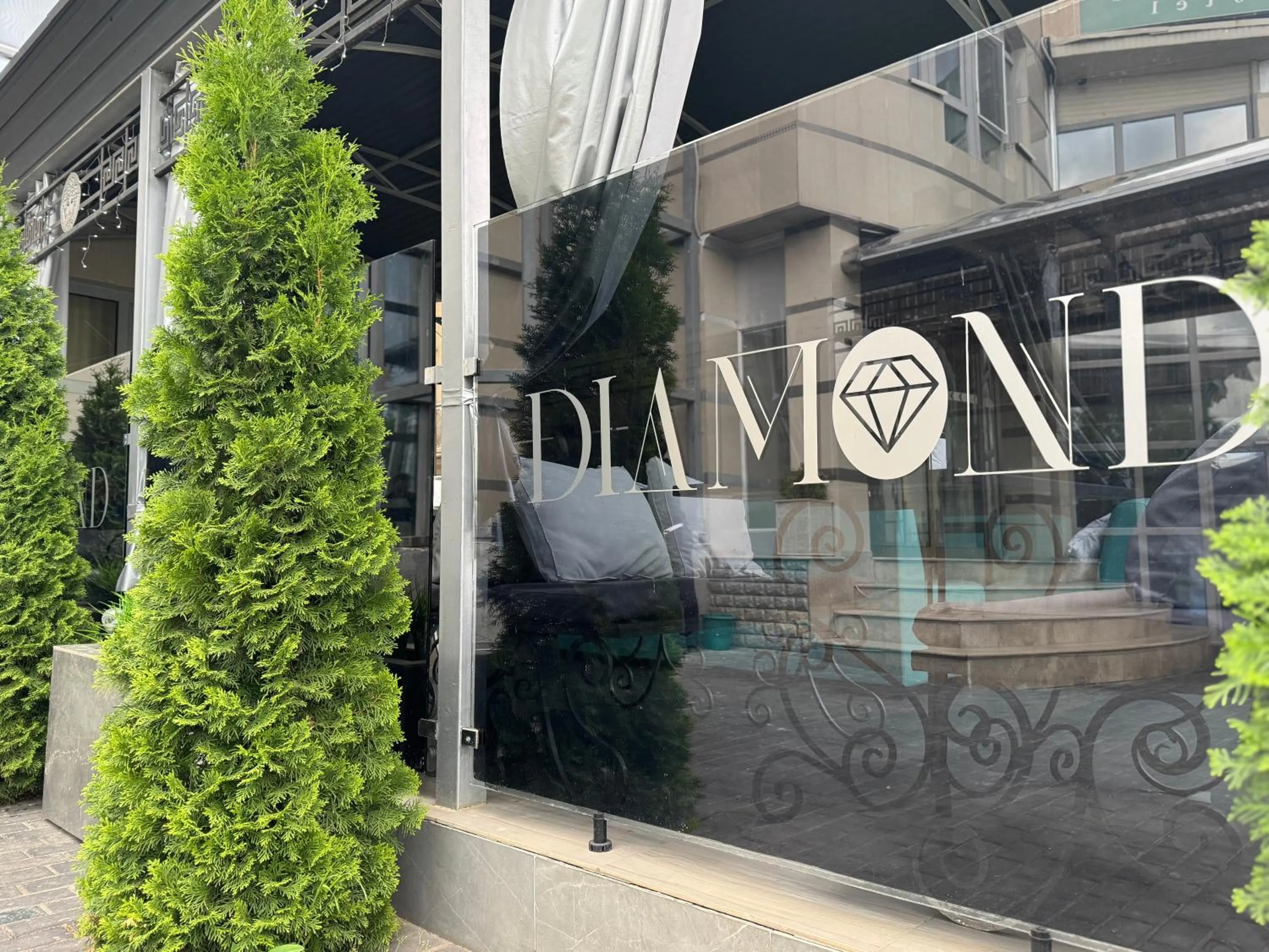Property logo or sign in Diamond Hotel