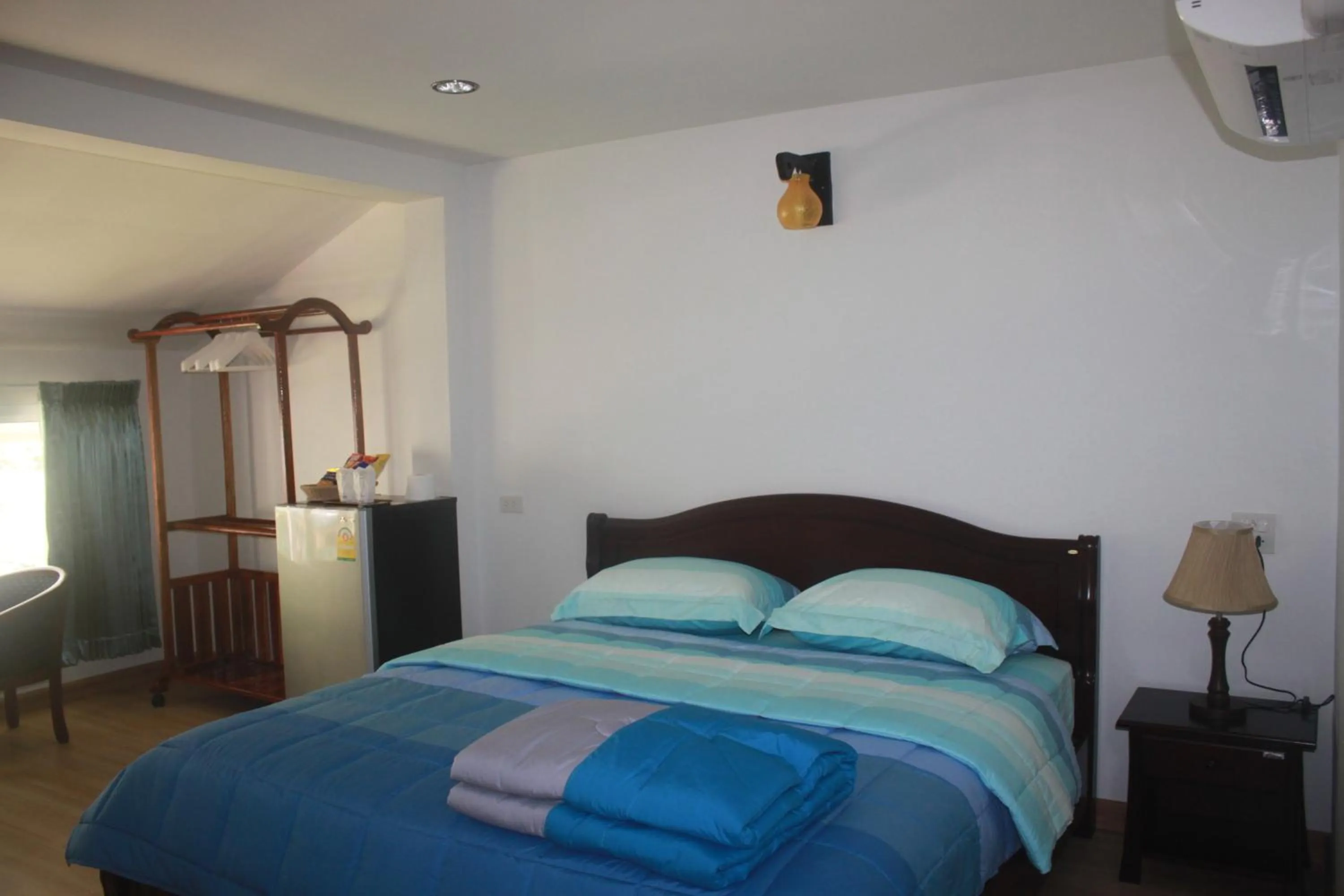 Day, Bed in Nong Nuey Rooms