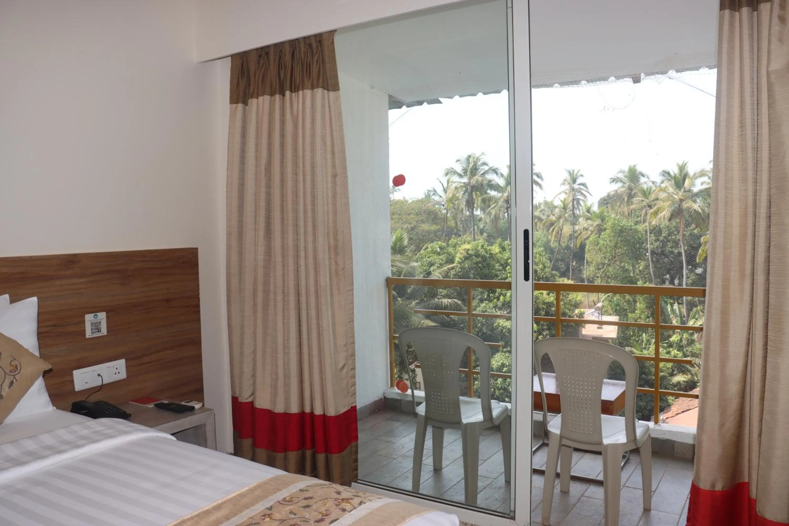 View (from property/room), Bed in Turtle Beach Resort - Morjim