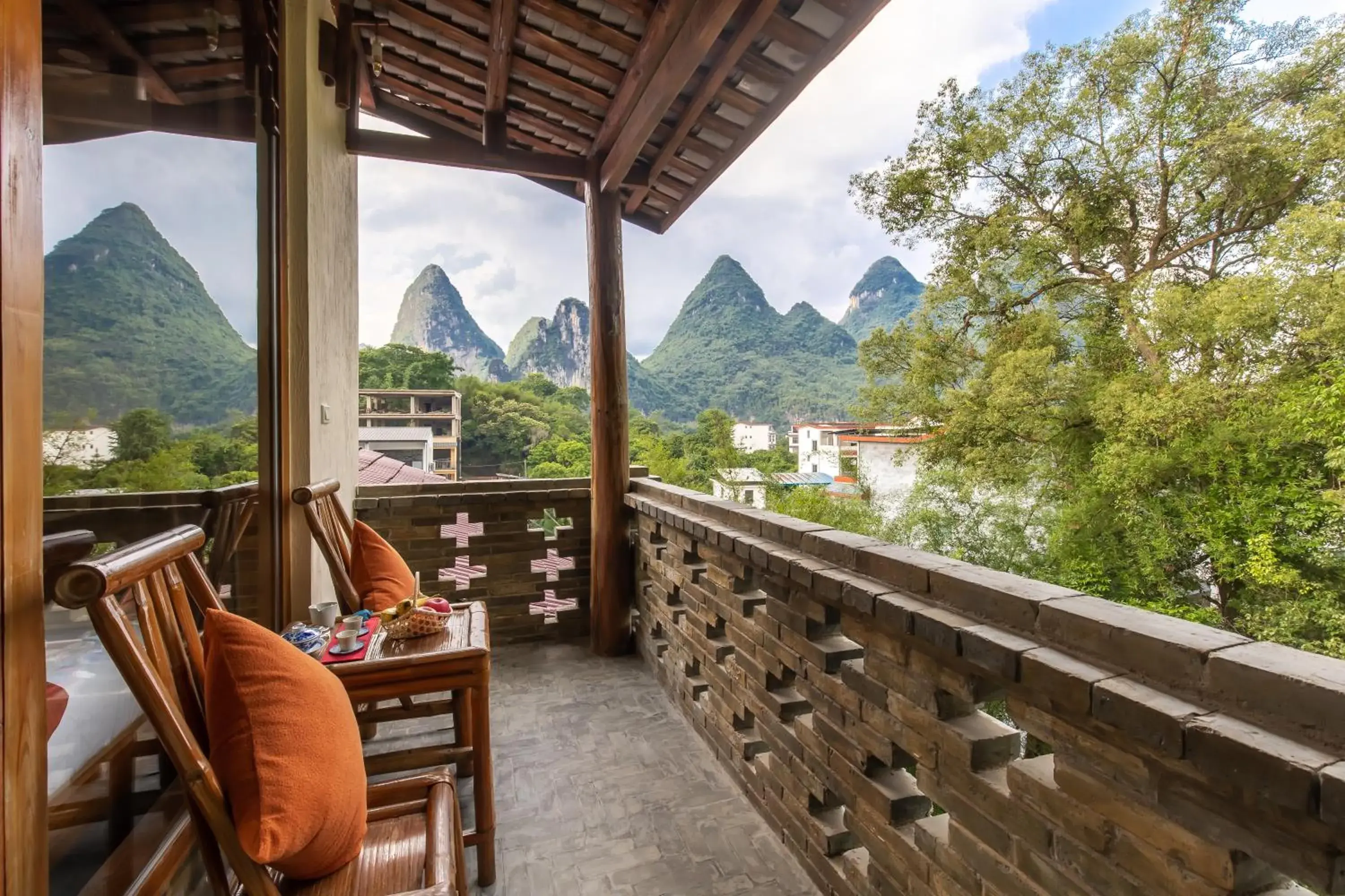 Deluxe Triple Room in Yangshuo River Lodge Hotel - Airport or TS Free pick up over 3 nights Deluxe Triple Room in Yangshuo River Lodge Hotel - Airport or TS Free pick up over 3 nights