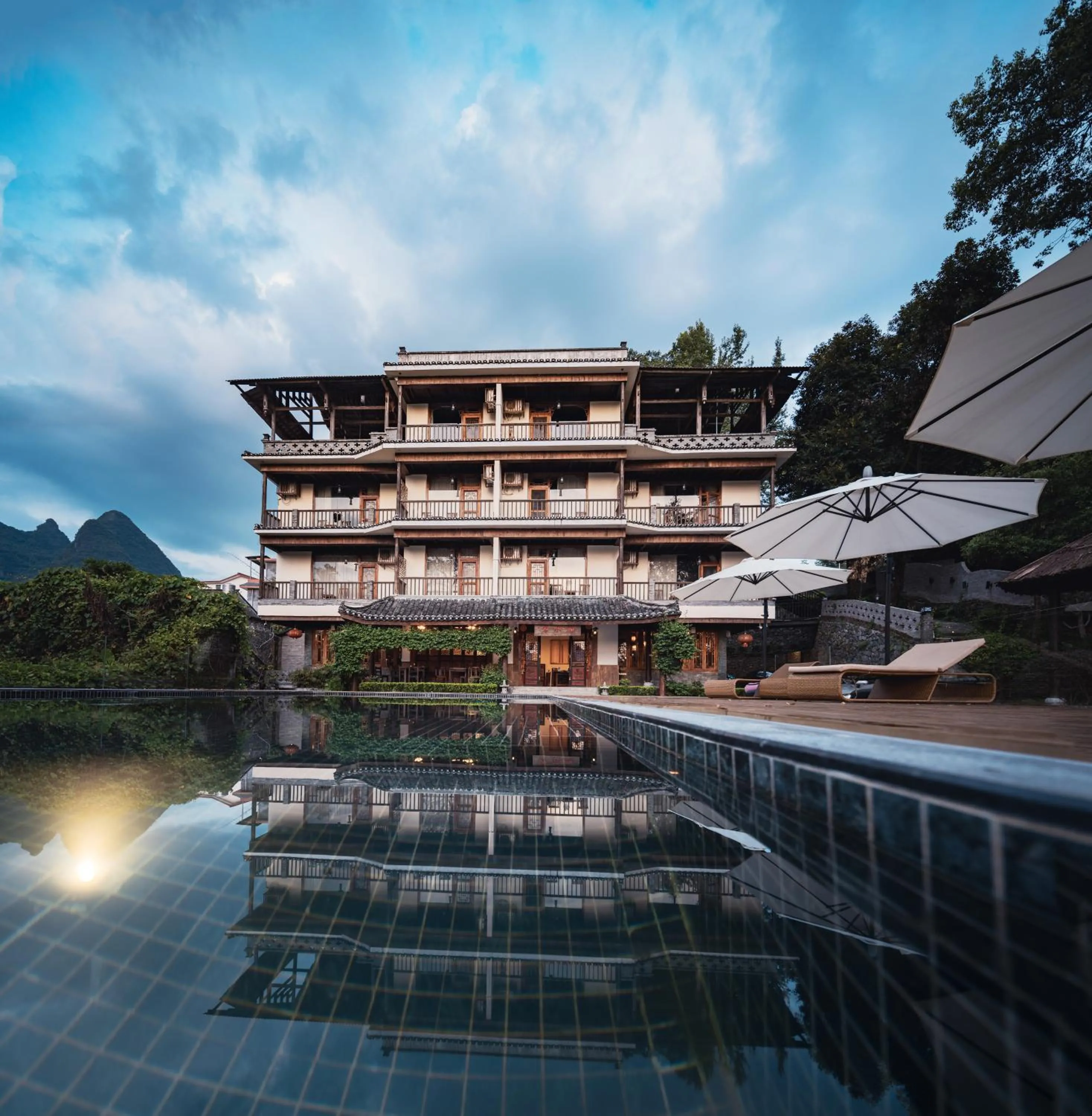 Swimming pool in Yangshuo River Lodge Hotel - Airport or TS Free pick up over 3 nights