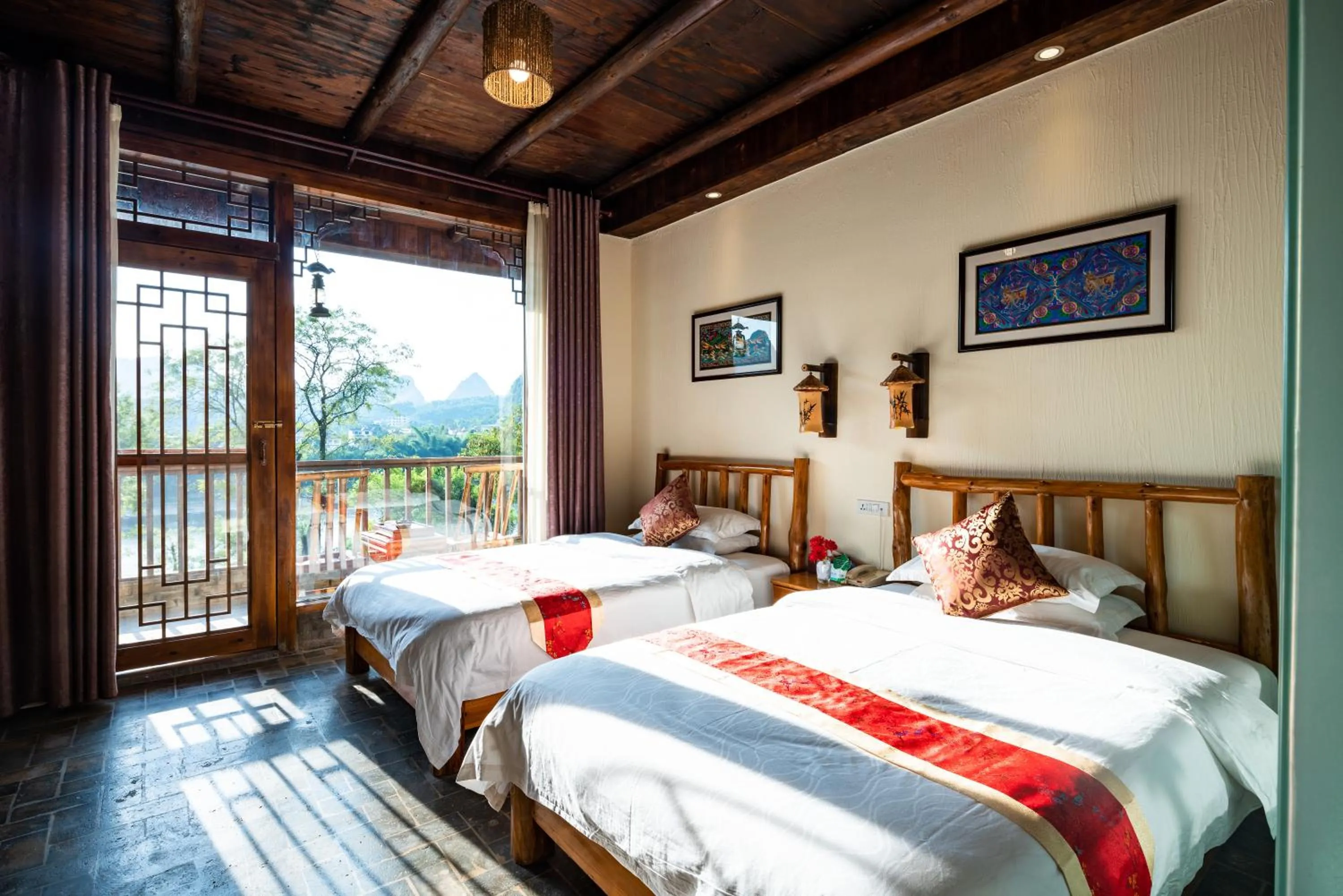 Photo of the whole room, Bed in Yangshuo River Lodge Hotel - Airport or TS Free pick up over 3 nights