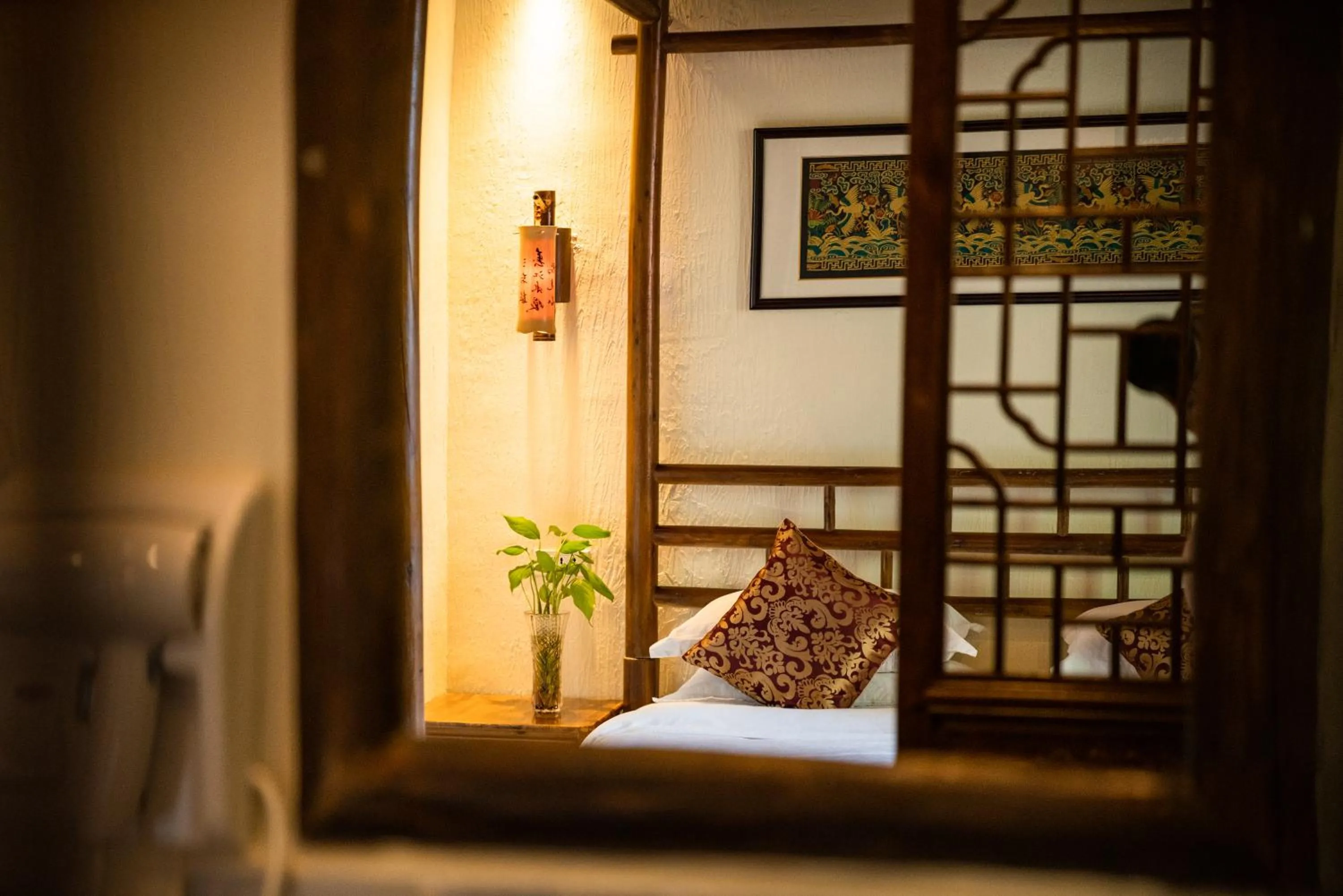 Decorative detail, Bed in Yangshuo River Lodge Hotel - Airport or TS Free pick up over 3 nights