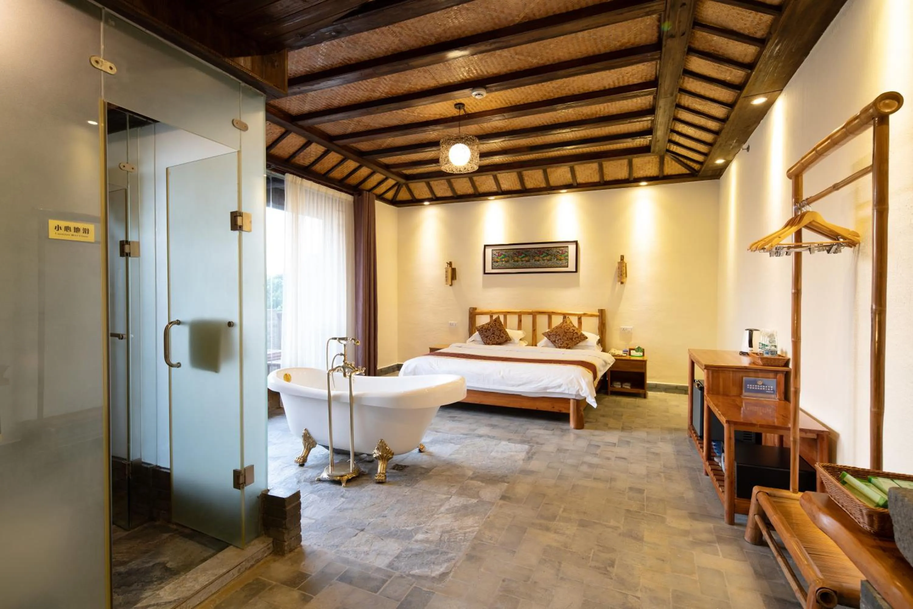 Photo of the whole room, Bed in Yangshuo River Lodge Hotel - Airport or TS Free pick up over 3 nights