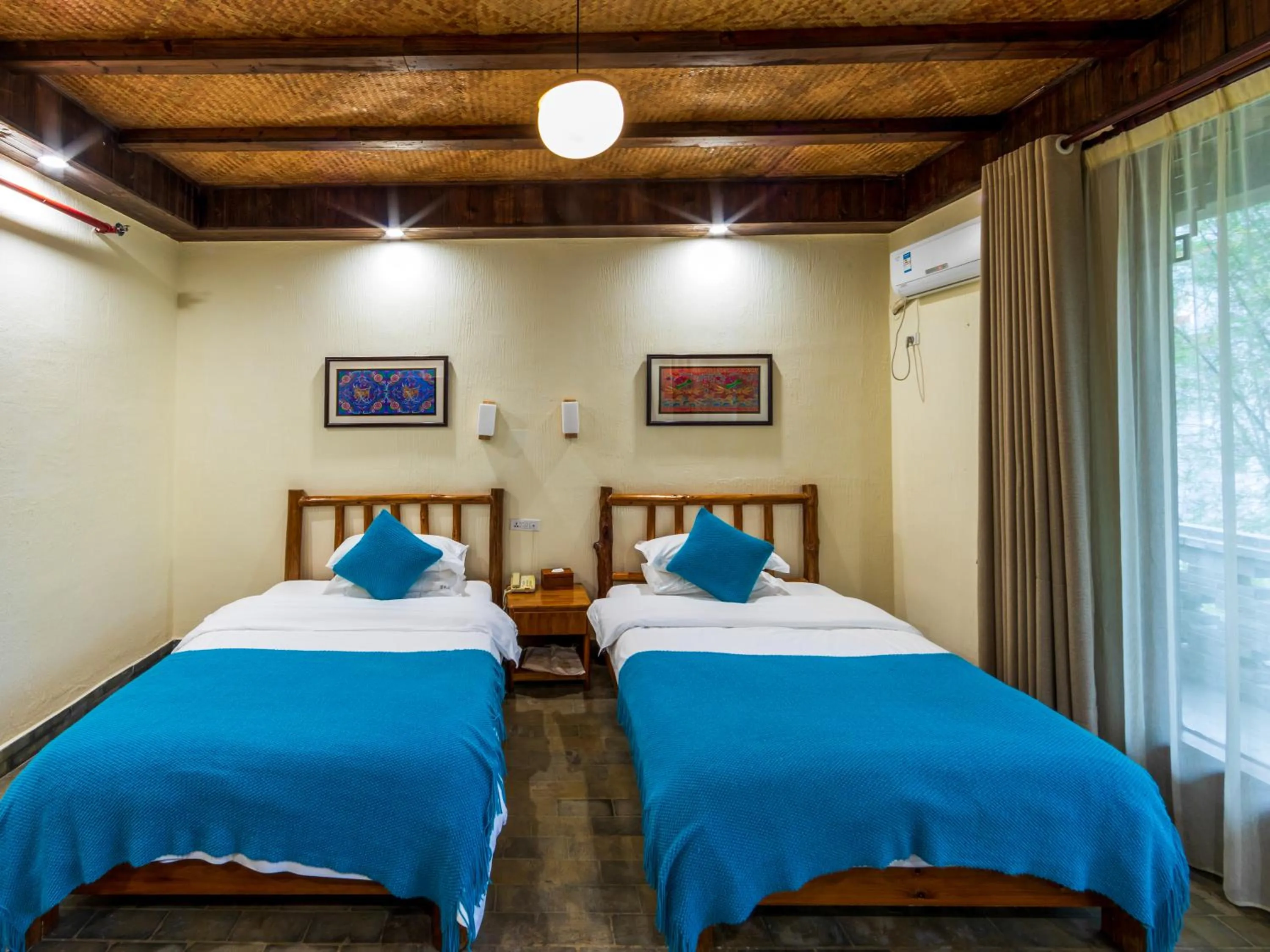 Bedroom, Bed in Yangshuo River Lodge Hotel - Airport or TS Free pick up over 3 nights