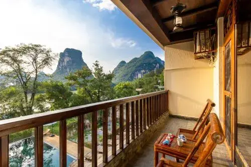 Deluxe River view queen bed room in Yangshuo River Lodge Hotel - Airport or TS Free pick up over 3 nights Deluxe River view queen bed room in Yangshuo River Lodge Hotel - Airport or TS Free pick up over 3 nights
