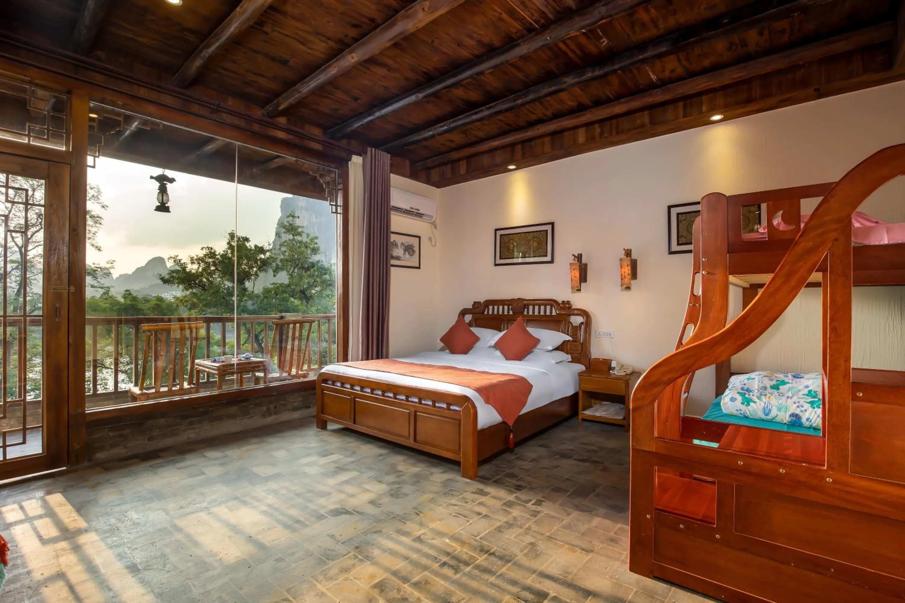 Photo of the whole room, Bed in Yangshuo River Lodge Hotel - Airport or TS Free pick up over 3 nights