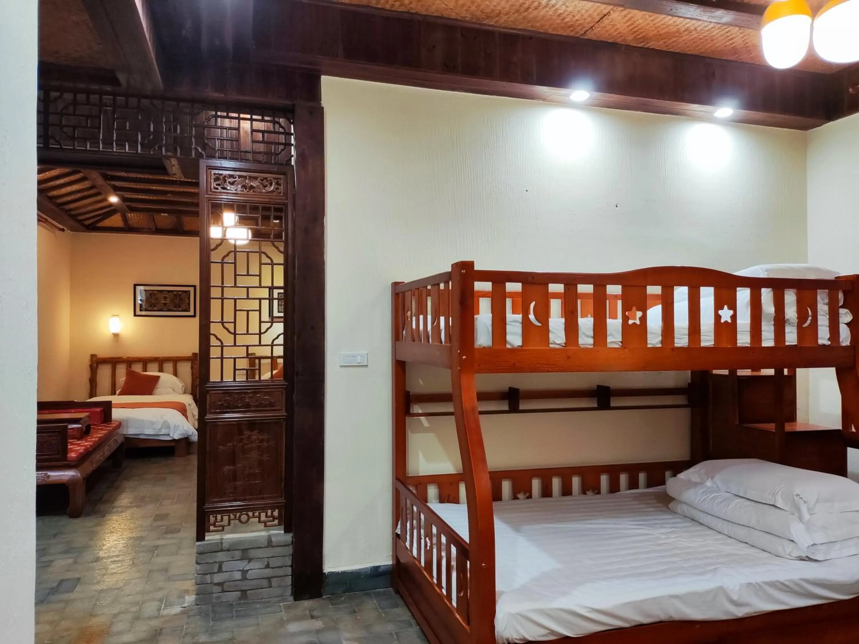 Photo of the whole room, Bed in Yangshuo River Lodge Hotel - Airport or TS Free pick up over 3 nights